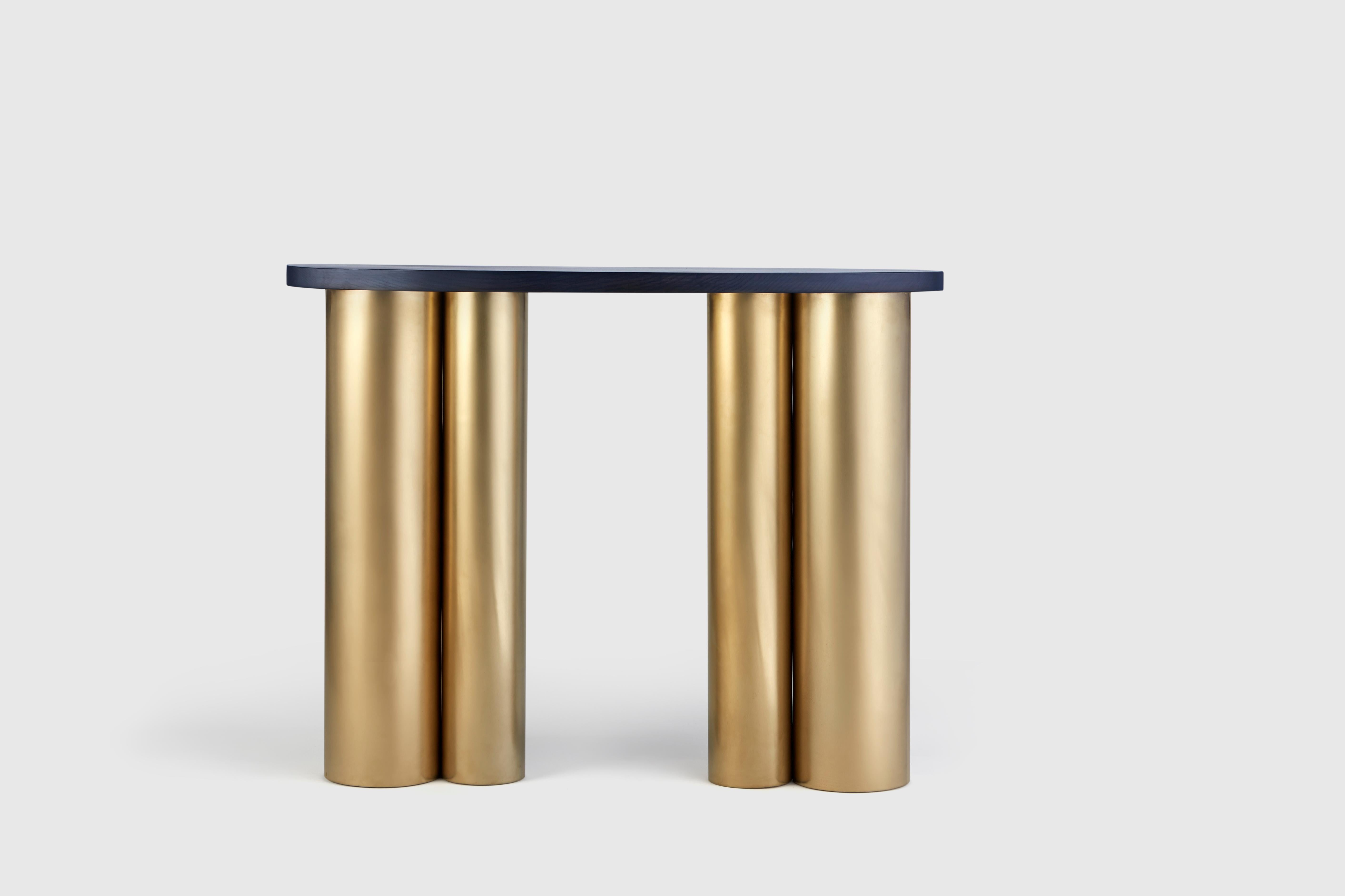 Unique bloom table gold by Hatsu.
Dimensions: D 40 x W 40 x H 80 cm.
Materials: stained solid wood on eloctroplated steel body.

Hatsu is a design studio based in Mumbai that creates modern lighting that are unique and immediately recognisable.