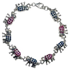 Vintage Unique Blue Sapphire and Ruby Studded Elephant Bracelet in 925 Sterling Silver