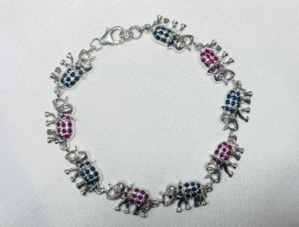 De las mujeres Pulsera única de zafiro azul y rubí con tachuelas de elefante en plata de ley 925 en venta