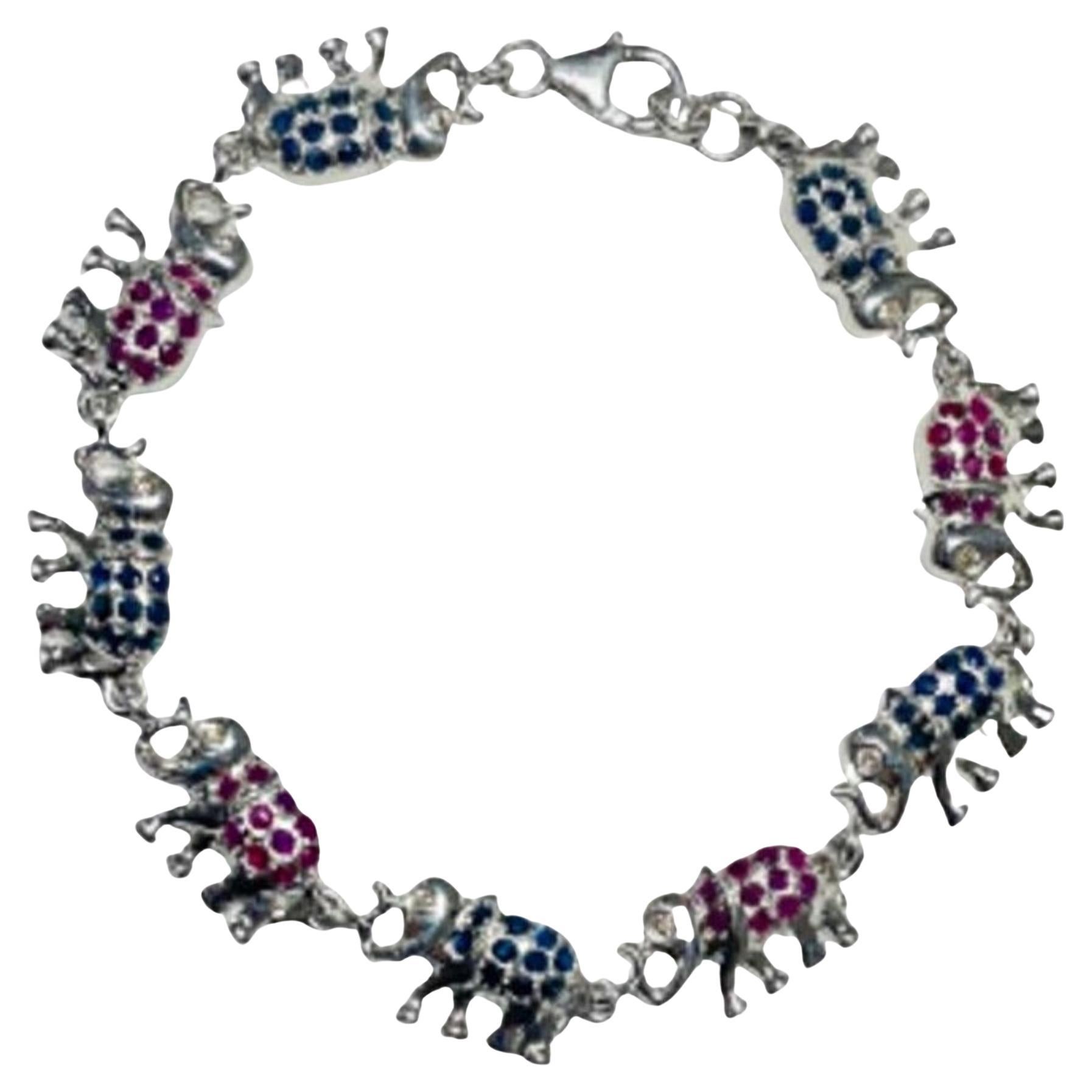 Bracciale unico con elefante tempestato di zaffiri blu e rubini in A. Silver 925