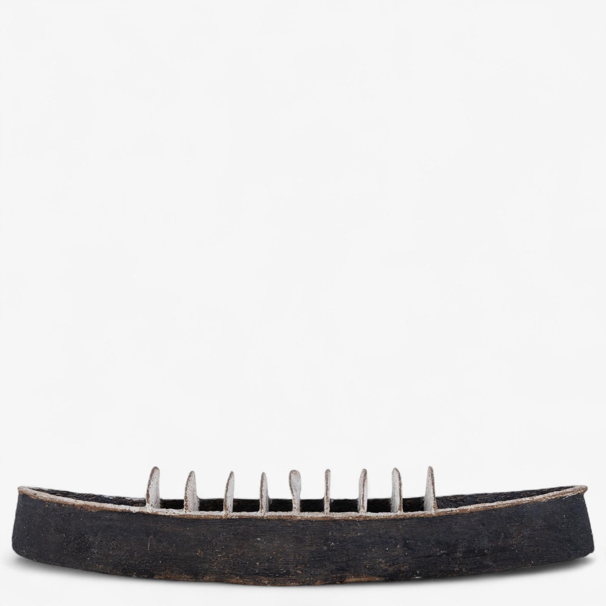Boat-shaped sculpture in stoneware with brown-black and gray-white glaze. Unique. Made by Gunhild Aaberg.