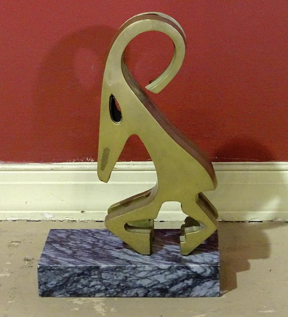 Heavy weight antelope figure in brass set on a marble base.
(Please confirm item location - NY or NJ - with dealer).
 