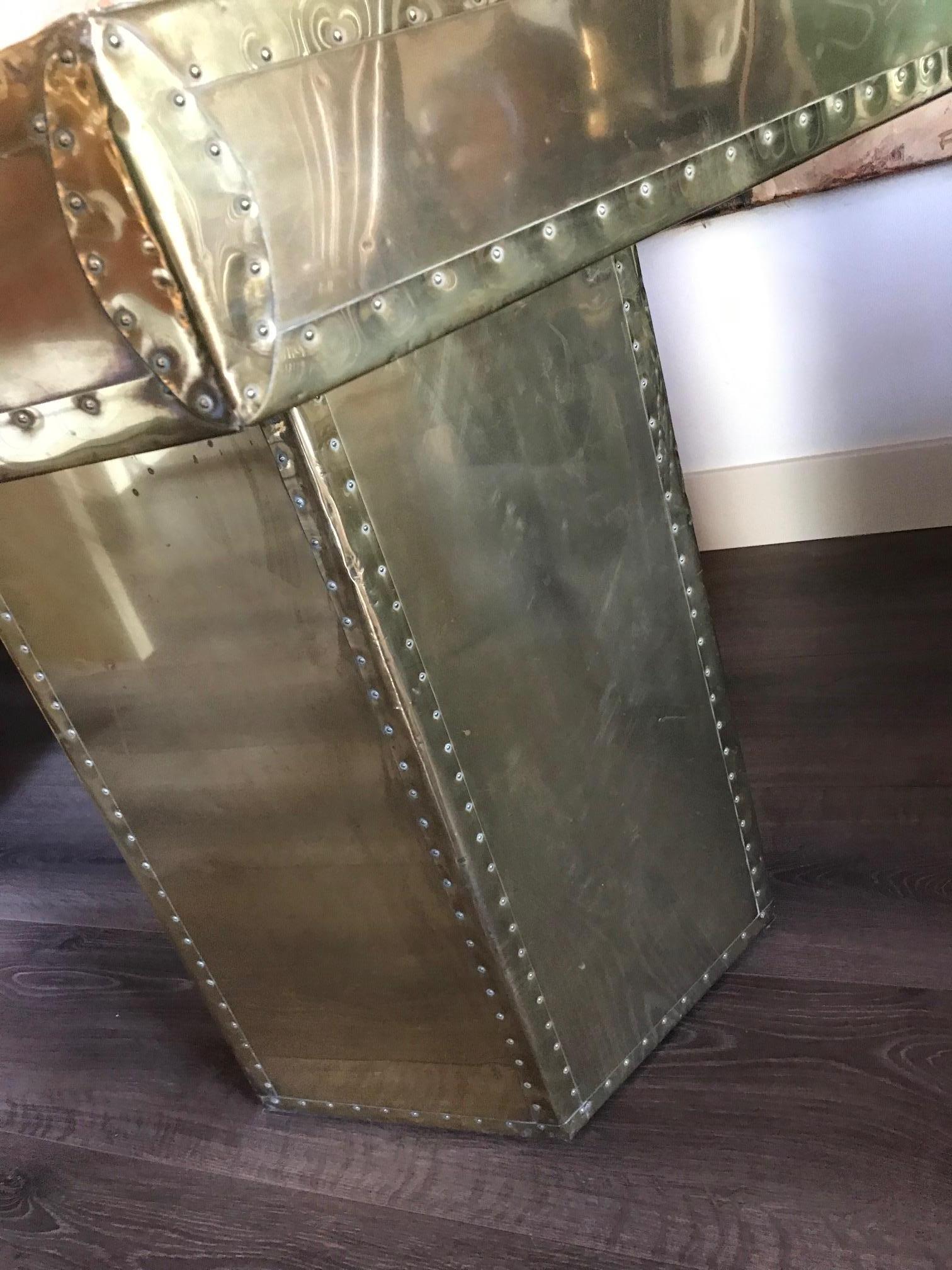We never seen something like this item before. Unique hexagon brass table. Brutalist with brass head nails. Very decorative. France 1960's
