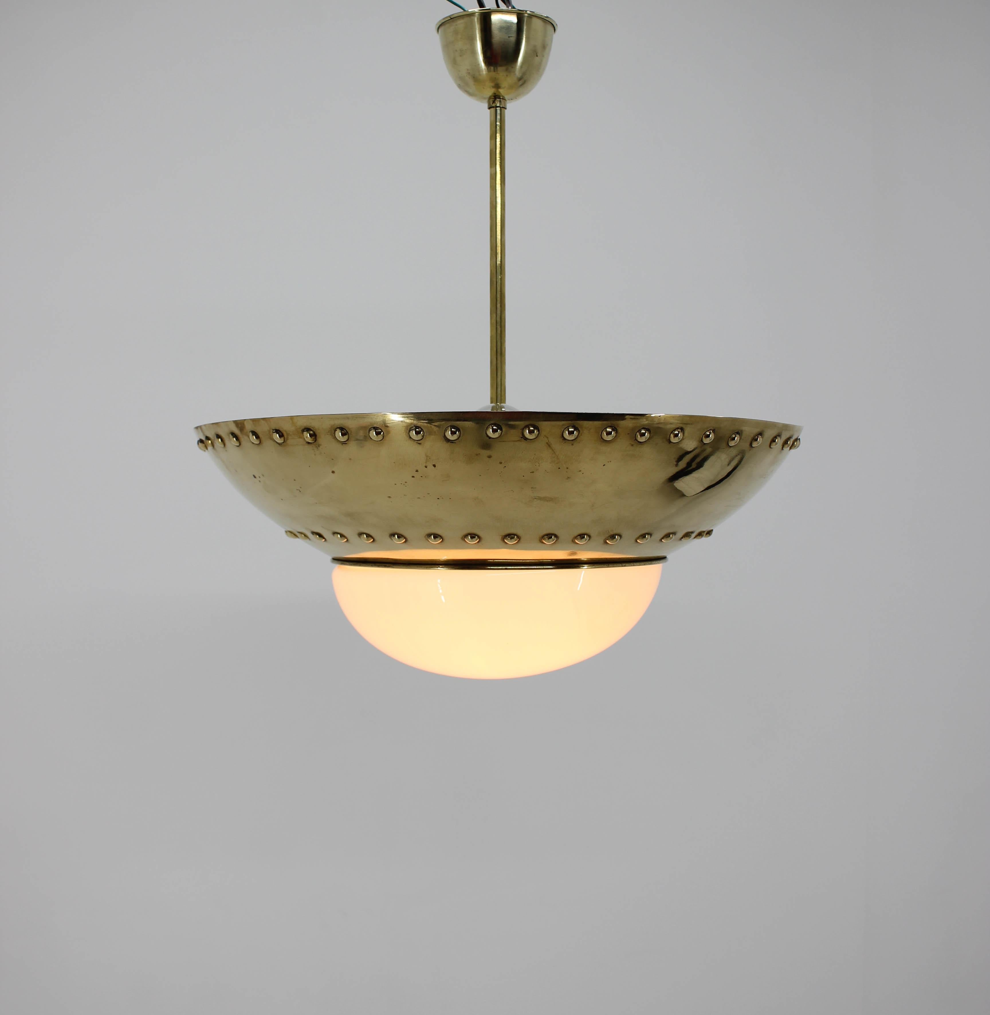 This unique very first UFO style chandelier by Franta Anyz for IAS looks like from Jules Verne book. Two indirect lights could be switched separately. Repolished. Rewired. Two pieces available!