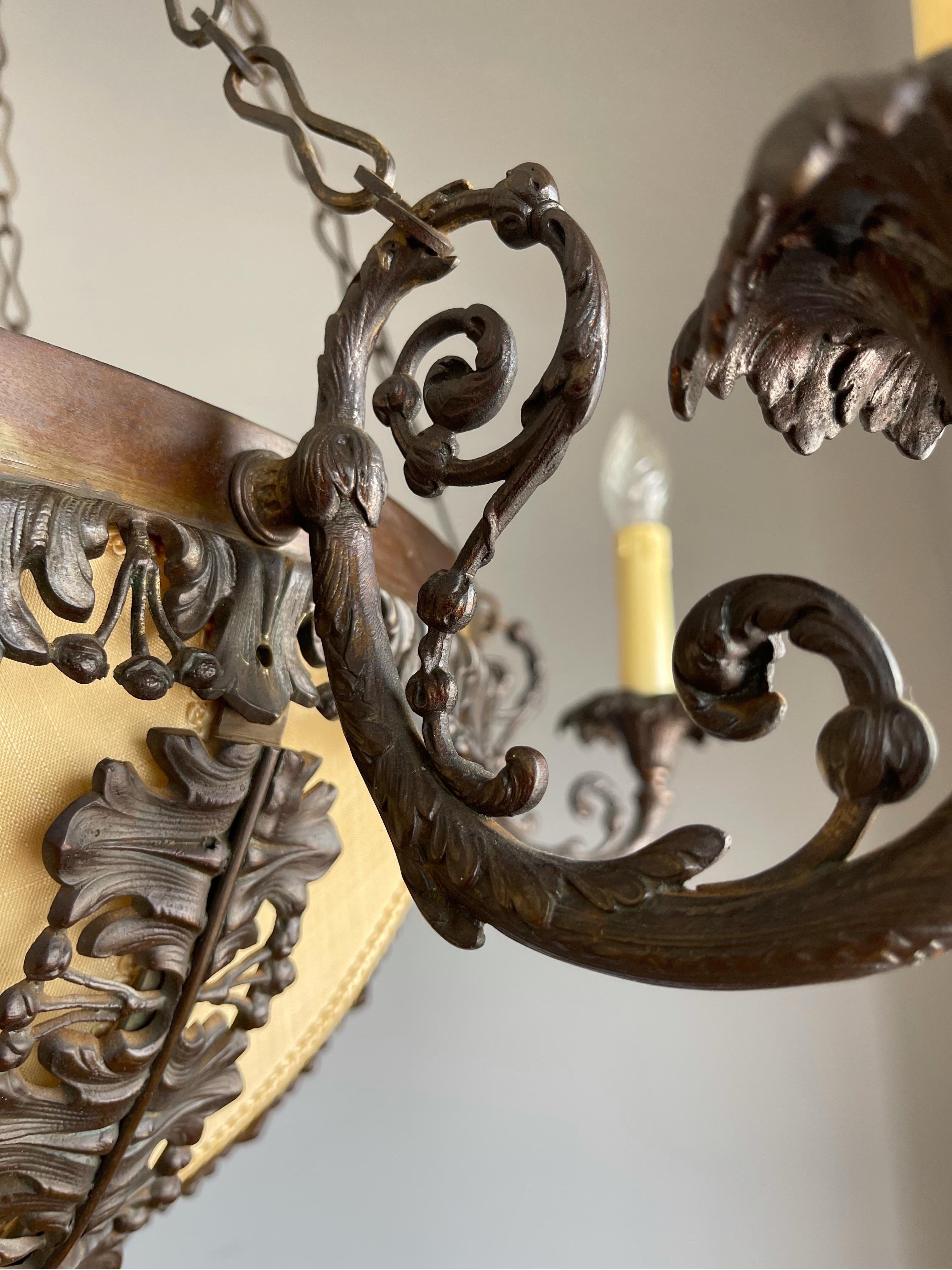 European Unique Bronze Arts & Crafts Era Stately Chandelier w Intricate Scrolling Details