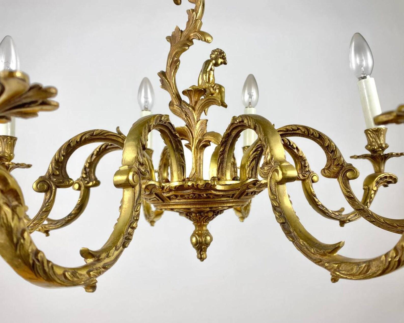 Baroque Unique Bronze Chandelier With Cherub Figurine  8 Arm Chandelier For Sale