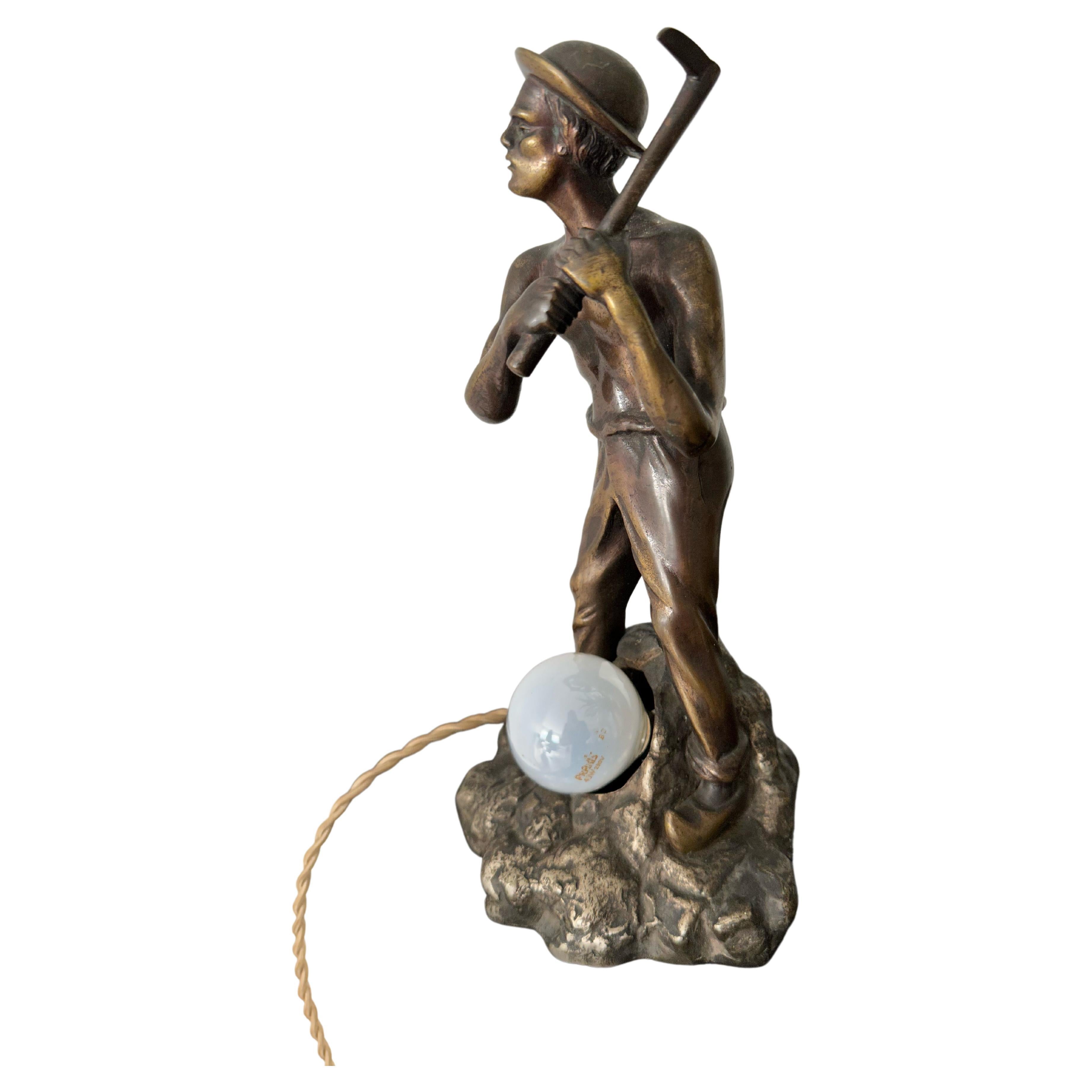 Sculpture / lampe de table statue unique en bronze représentant un moineur ou un digger en or avec base argentée