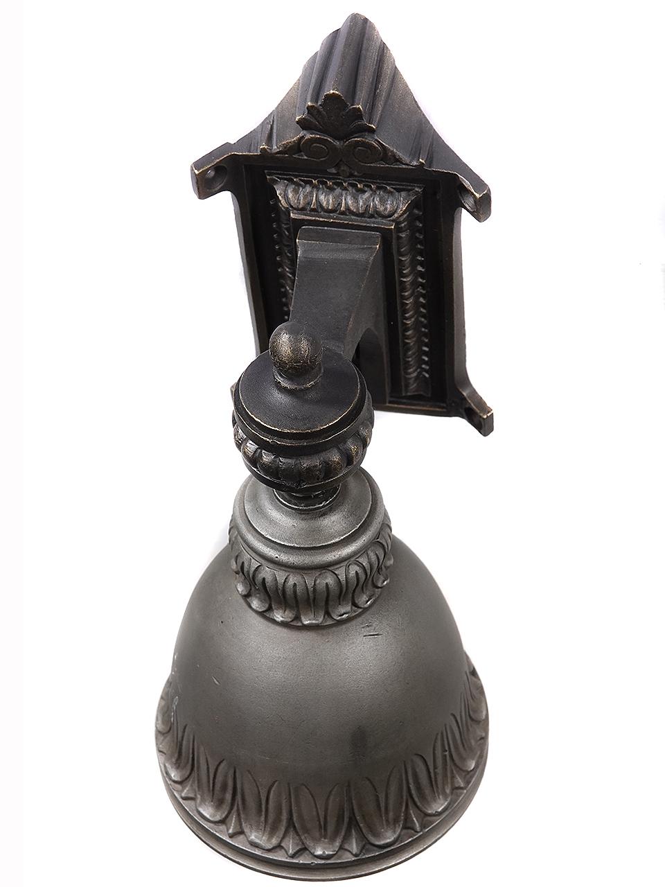 This is a rare gem. You may not see another one. The lamp and wall bracket are designed to fit into the corner of a room or cabinet. The shade hangs from an articulated ball fitting and the inside has a shiny white porcelain lining. As with all RR