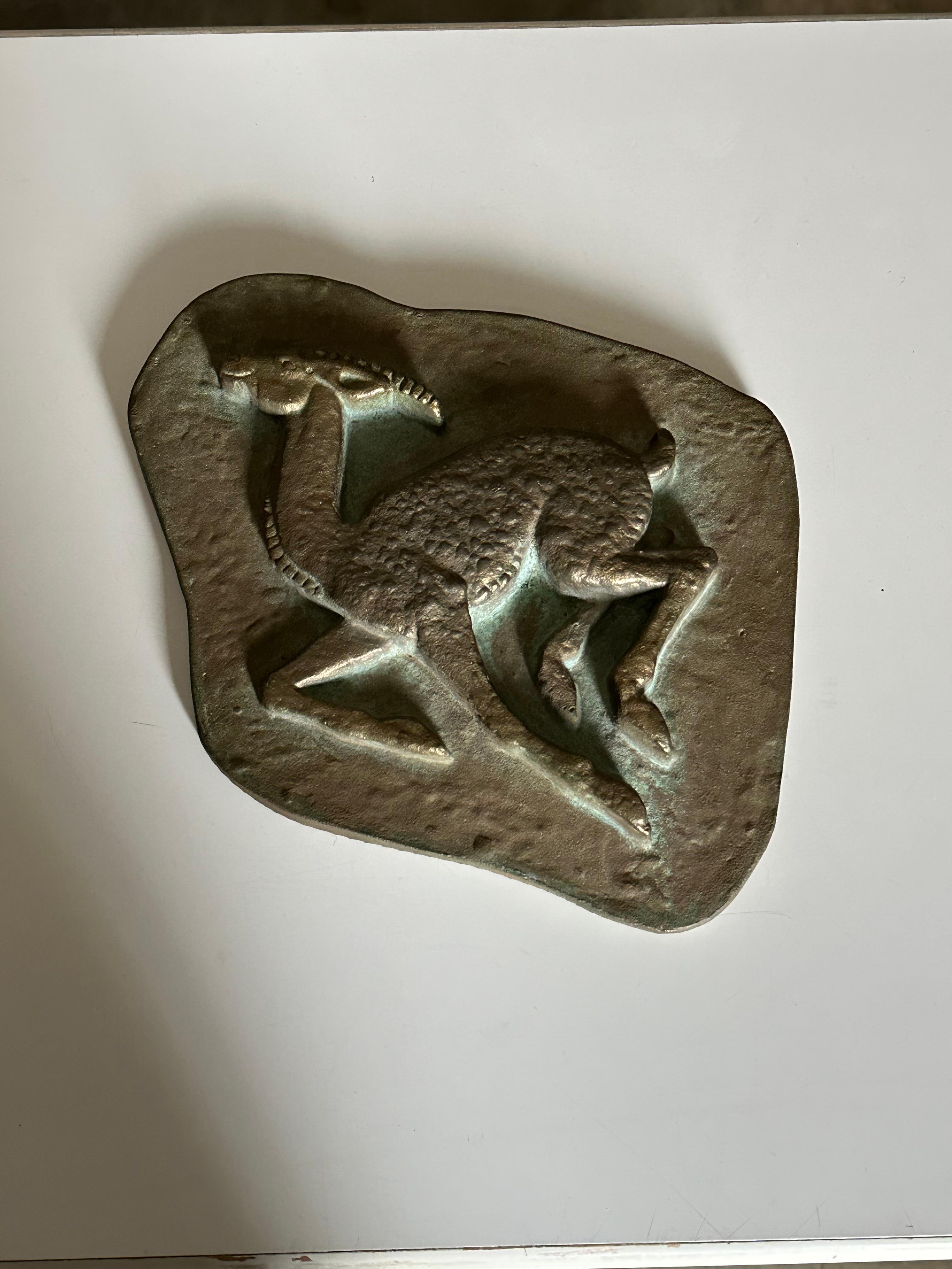 A well proportioned sculptural wall relief from Sweden in solid bronze, circa 1950s. Piece depicts an antelope with has a gorgeous green patina forming around the animal. Item weighs probably 5-6lbs and the main surface is also solid. there is a