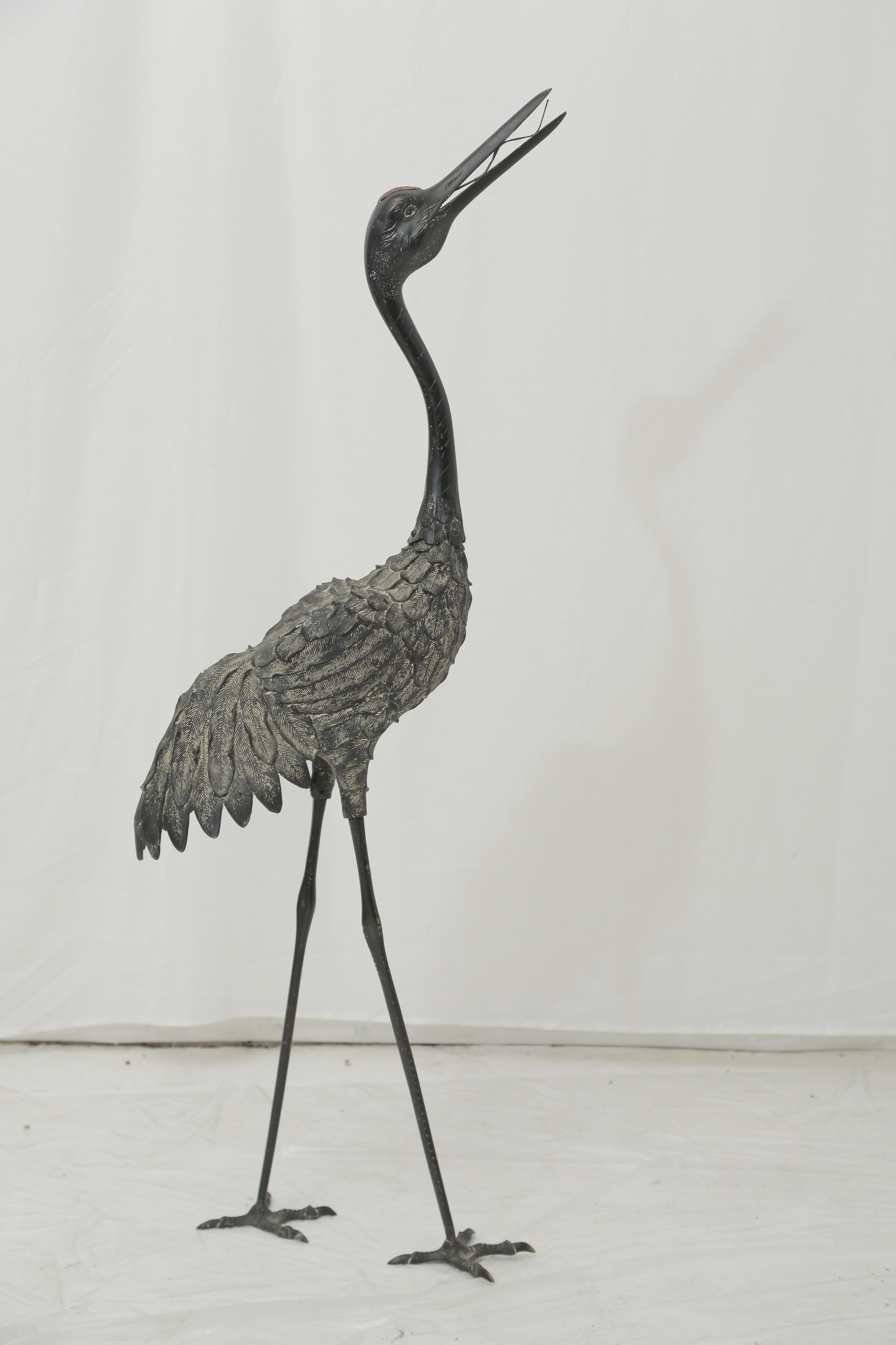 Sculpture made of bronze representing a Heron in the Chinese style, circa 1940.