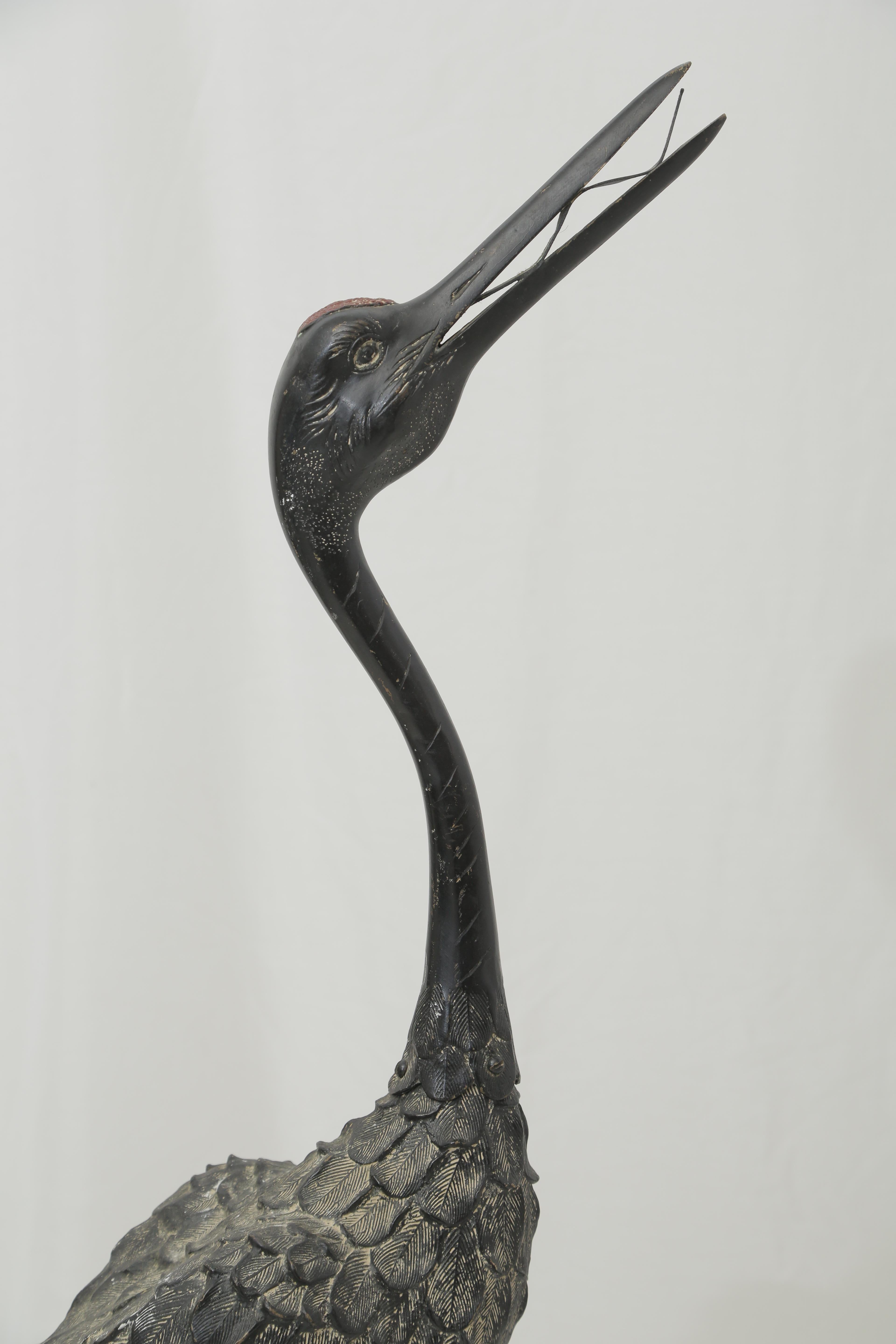 bronze heron sculpture