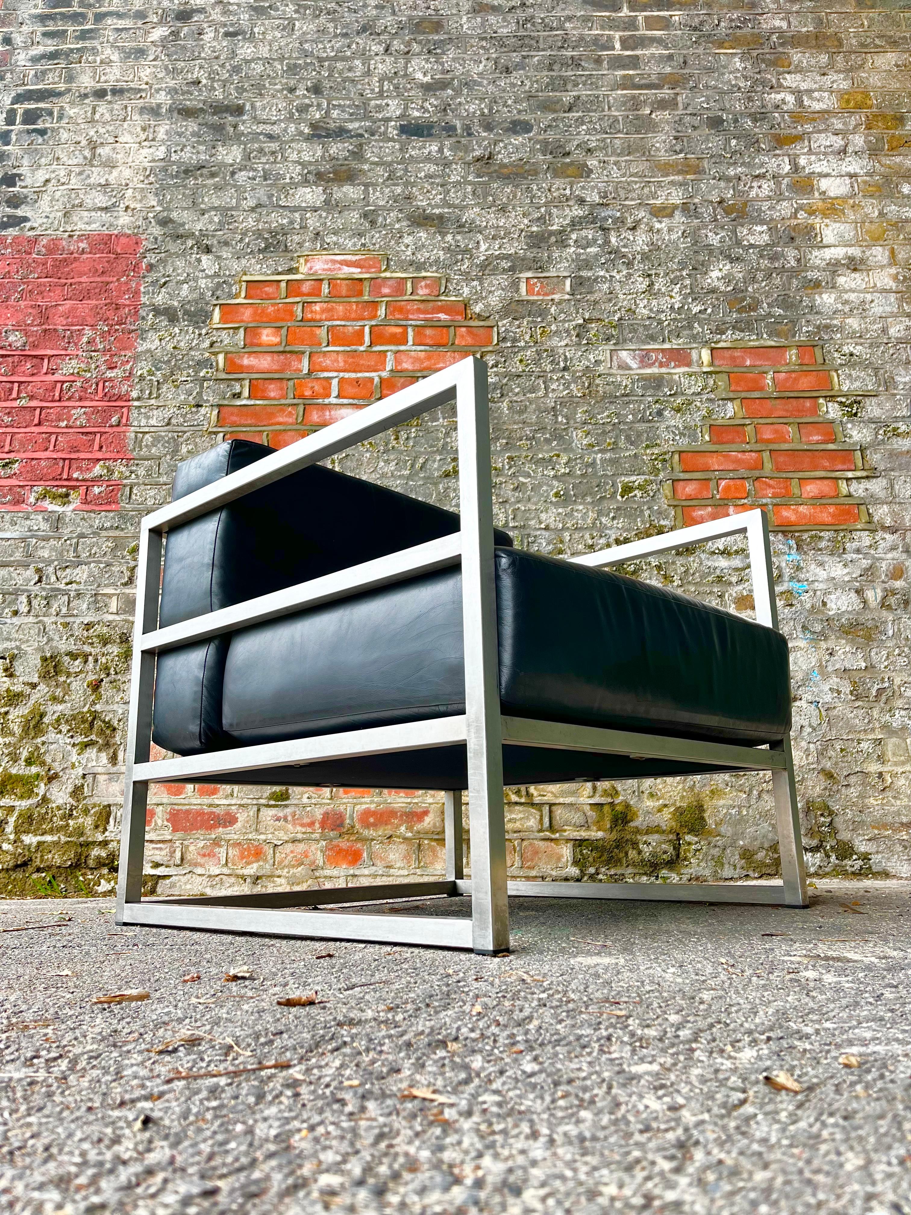 This unique and rather severe looking pair of 20th Century armchairs wouldn’t look out of place on the set of a Sci-fi movie…
Reminiscent of the Le Corbusier LC2 Bauhaus era design, the super sharp welded steel frames are paired with angular leather