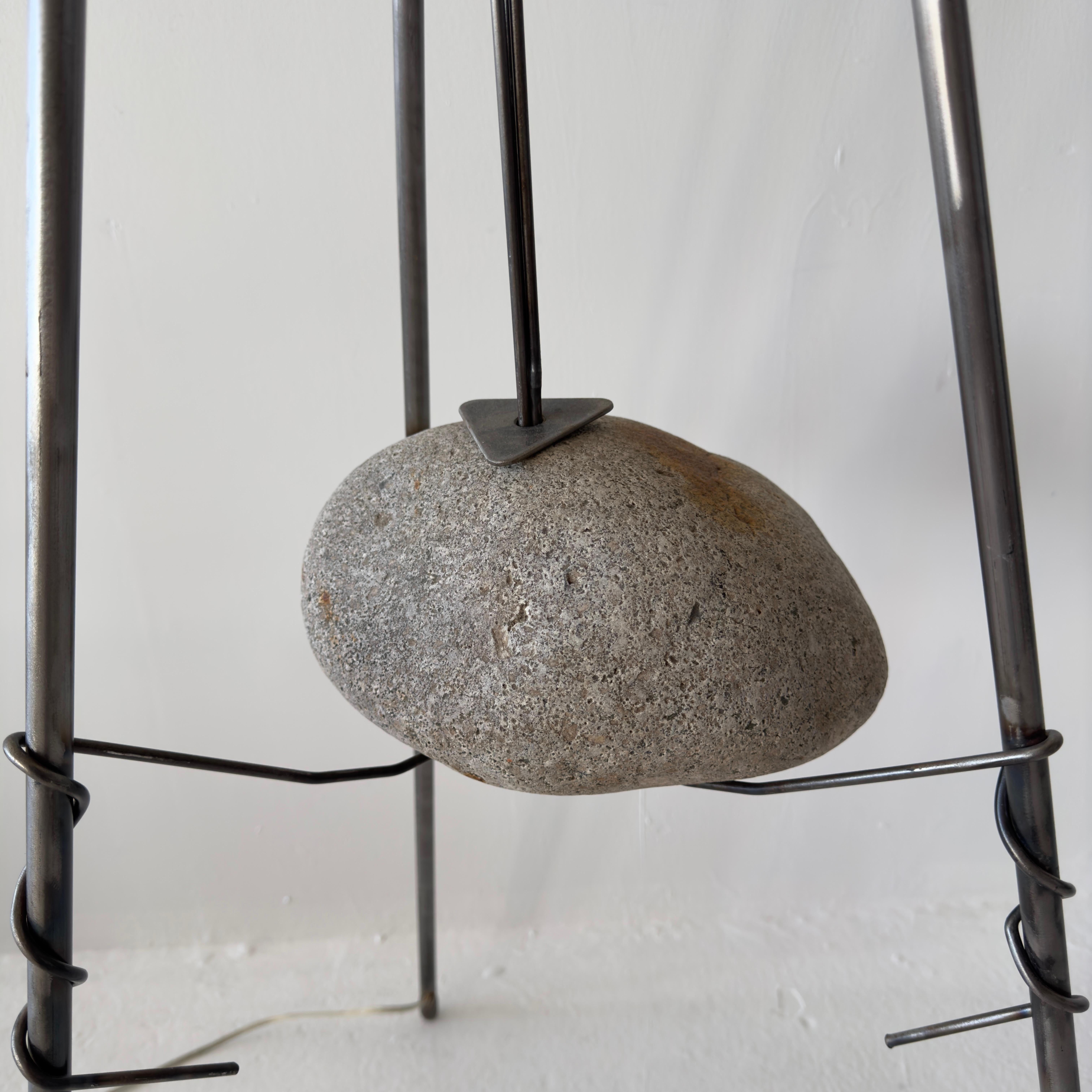 unique brutalist suspended stone floor lamp with twisted metal In Good Condition In Los Angeles, CA