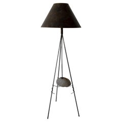 unique brutalist suspended stone floor lamp with twisted metal