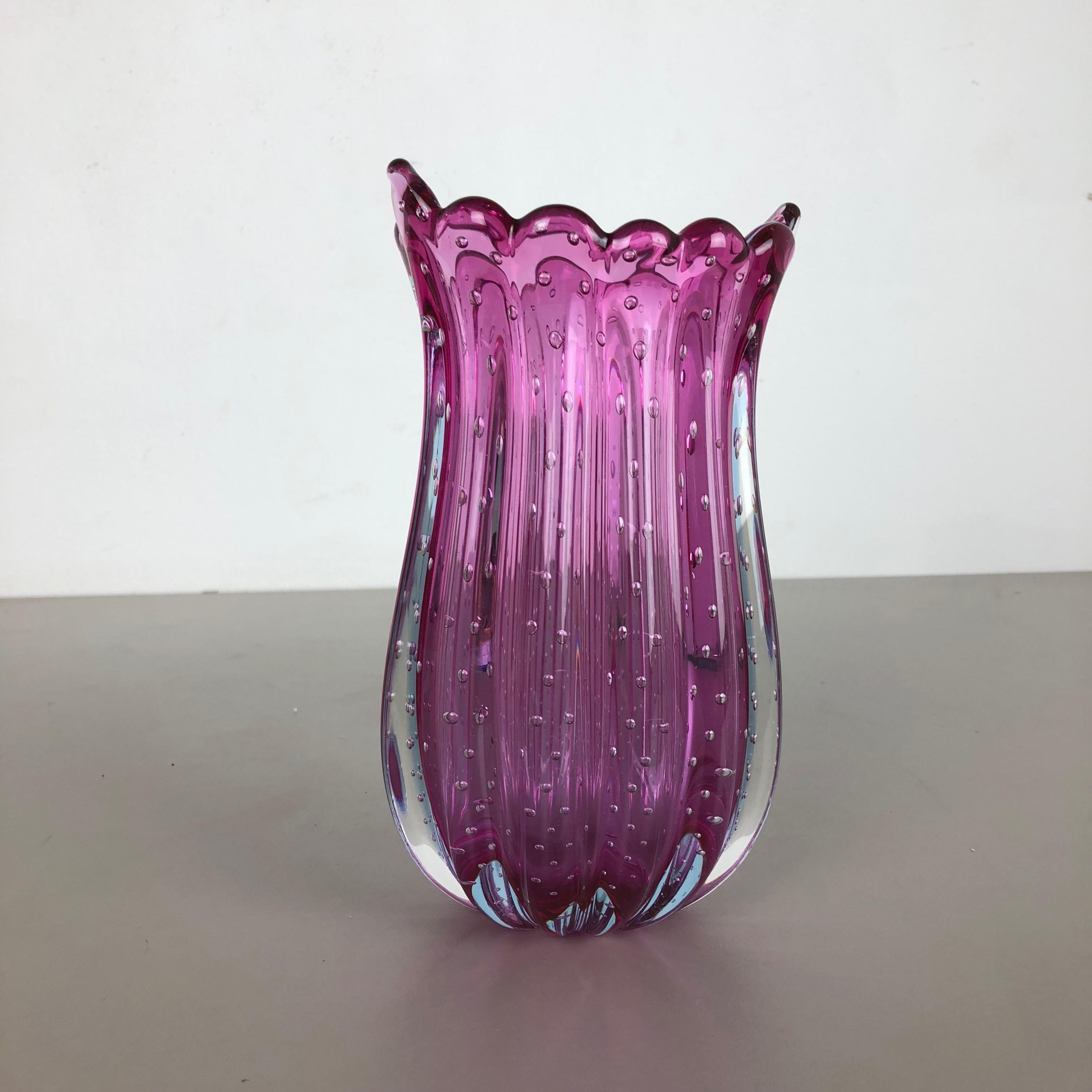 Article:

Murano glass vase element

Origin:

Murano, Italy


Design:

Archimede Seguso


Decade:

1970s


This original glass vase was produced in the 1970s in Murano, Italy and designed by Archimede Seguso. An elegant pink