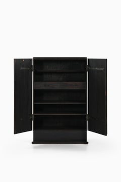 Unique Cabinet in Black Pine with Iron Fittings by Axel Einar Hjorth, 1930's