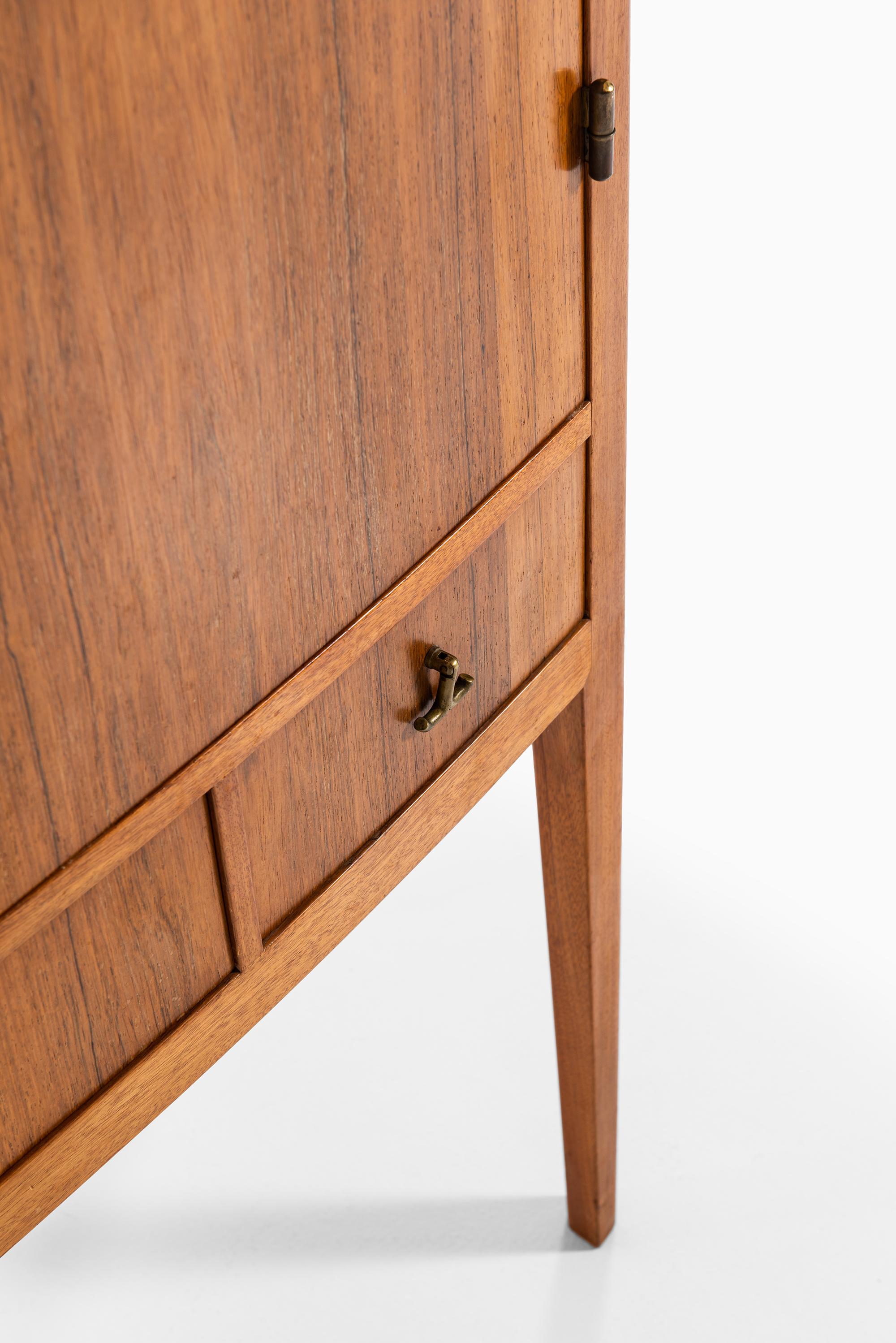 Scandinavian Modern Unique Cabinet in Rosewood and Brass Produced in Sweden