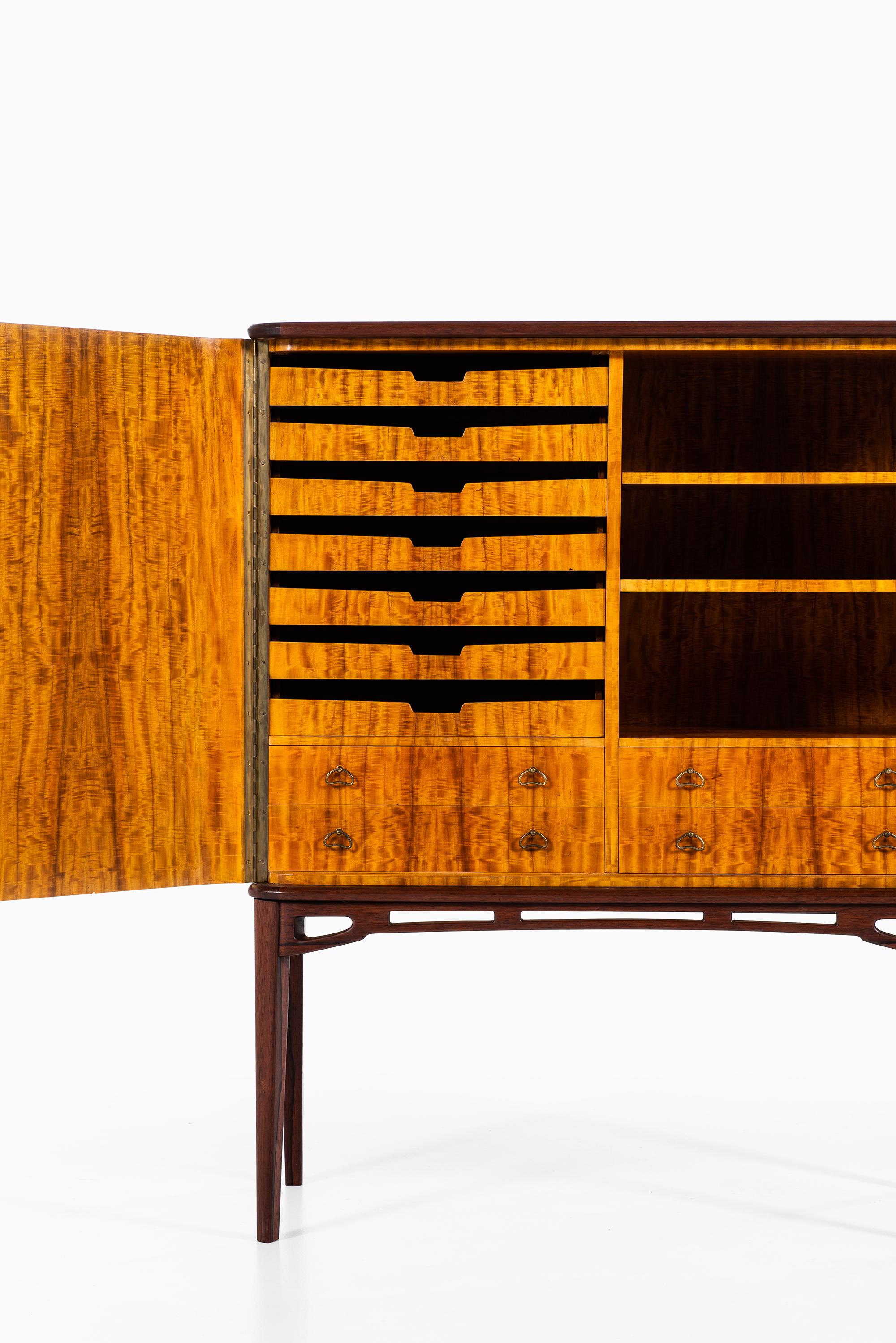Brass Unique Cabinet in Rosewood and Burlwood Produced in Sweden For Sale
