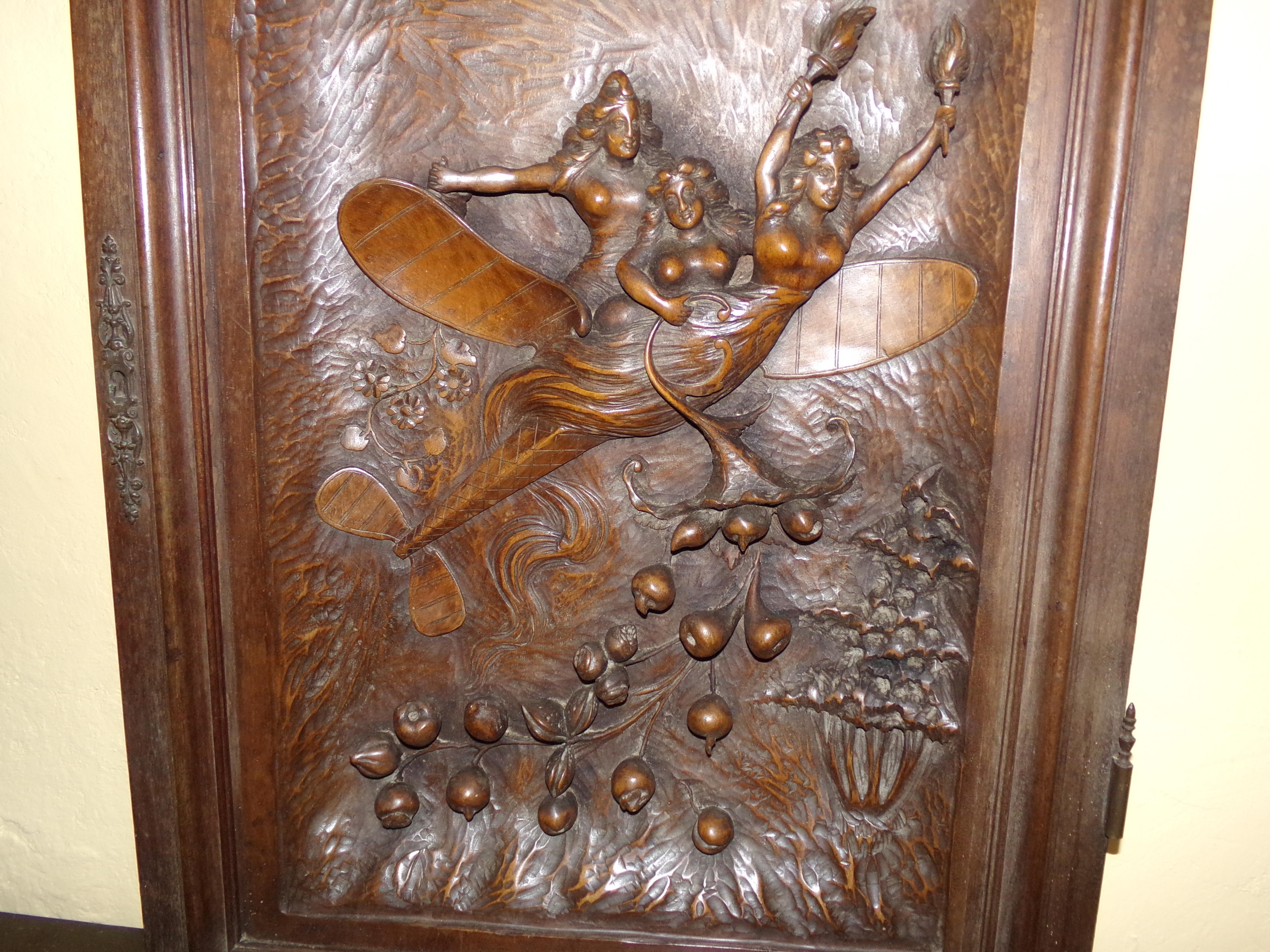 An outstanding quality hand carved door in solid Walnut representing a romanticized vision of the future of flight. 