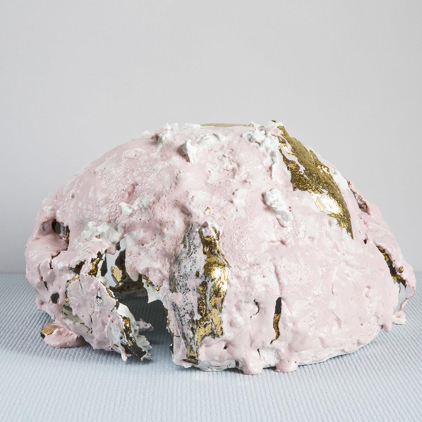Featuring pastel pink color and gold detail over a hemispherical design, this fascinating piece is part of a series of original and creative items made in total freedom and experimentation, with the addition of silicone, crystals, porcelain animals