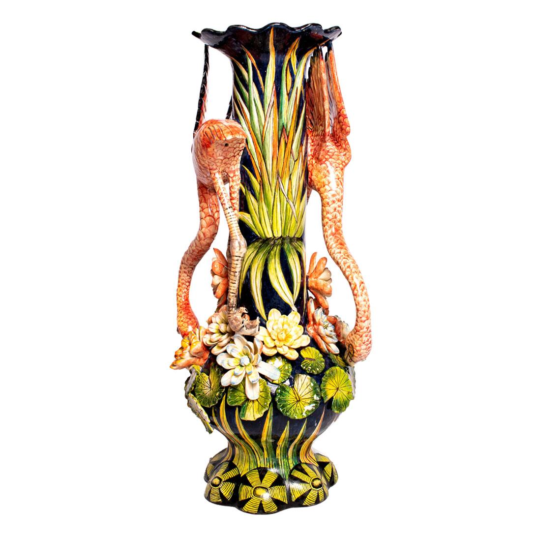 Introducing the captivating Flamingo Vase by Imvelo Natural Art—a true masterpiece of handcrafted elegance, meticulously crafted by South African artists renowned for their skill and creativity.

Hand-sculpted by the gifted artisan Teboho, the
