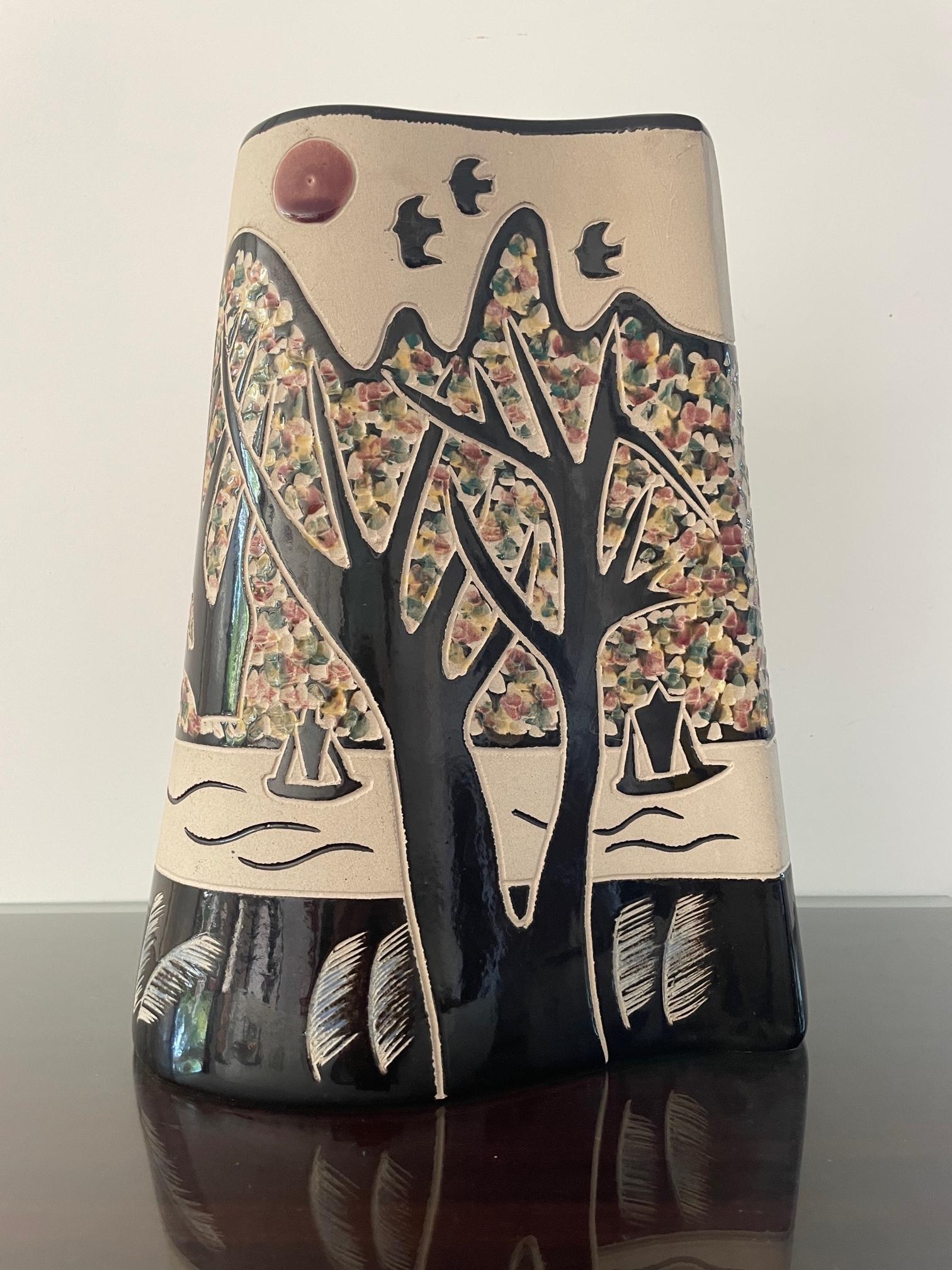 What a vase! This beautiful item is a must have for every collector of ceramics. 
It actually is a piece of art. Beautifully made and absolute stunning! It will be an attribution to every collection. Museum quality.