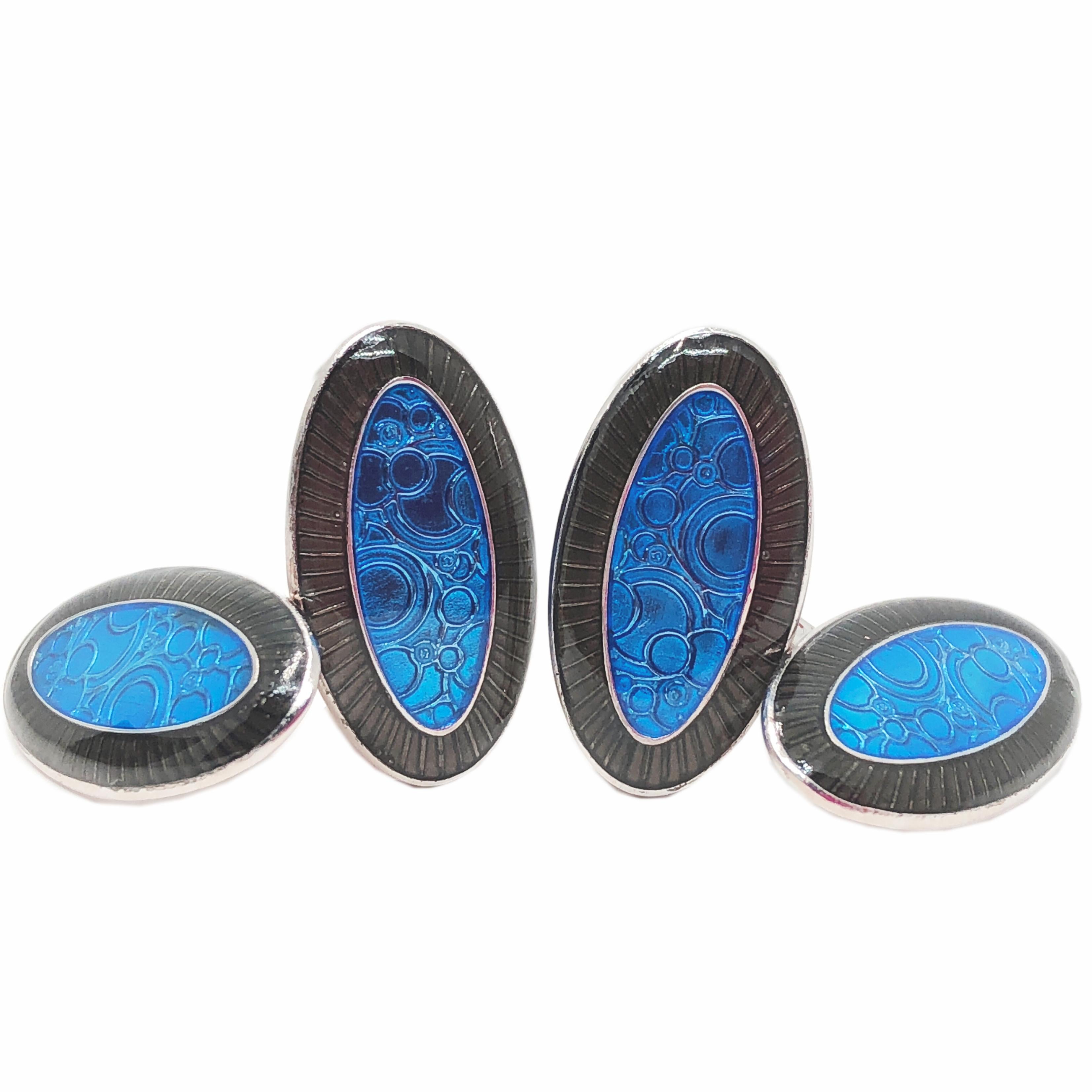 Unique Oval Hand Enamelled blue and gunmetal grey sterling silver cufflinks, champlevé technique.
This piece is a limited edition of an 1920s pair of cufflinks found in Berca's archives.


