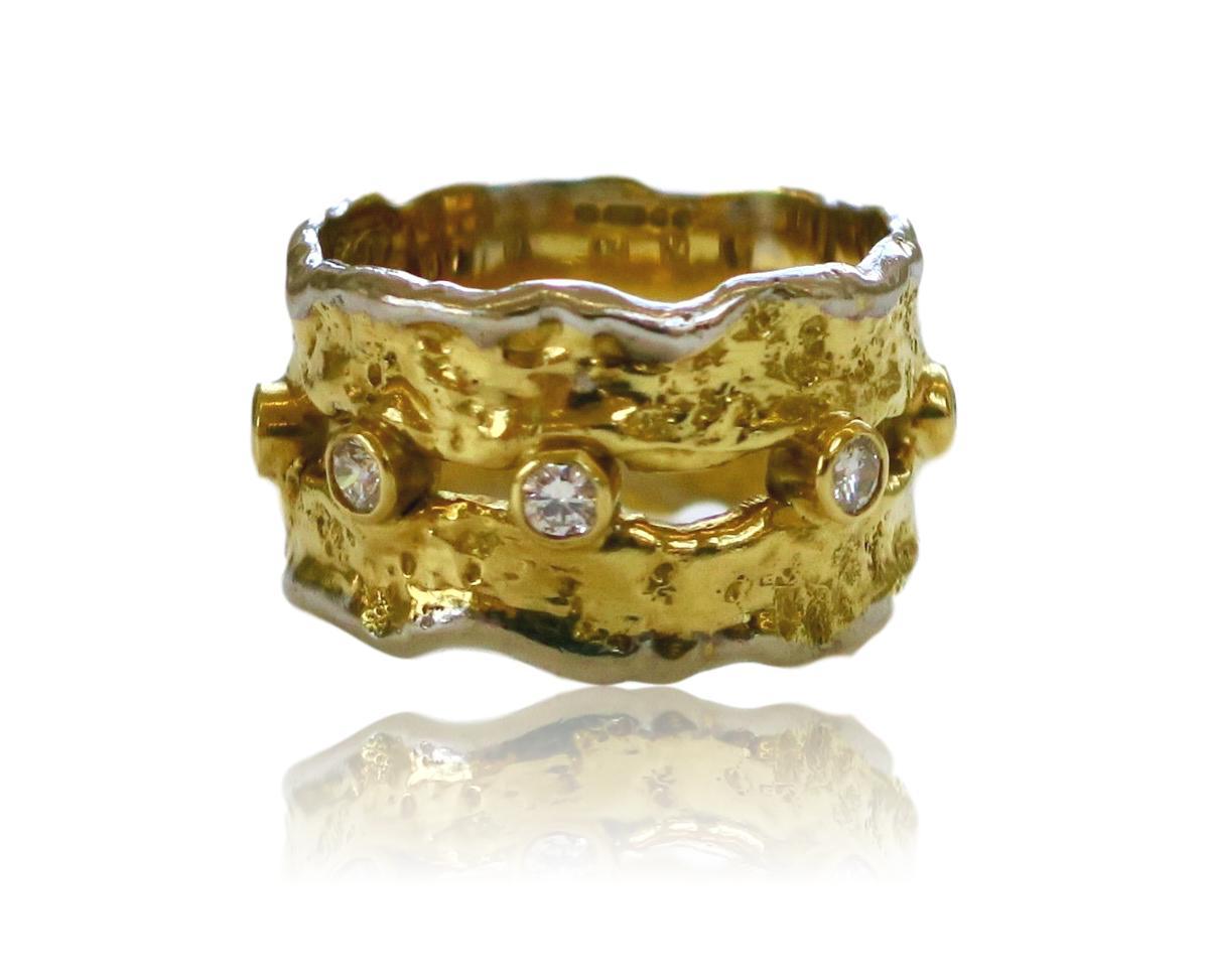 18k Yellow and white gold and diamond ring by British jewelry designer Charles de Temple. The mottled 18k  3/8