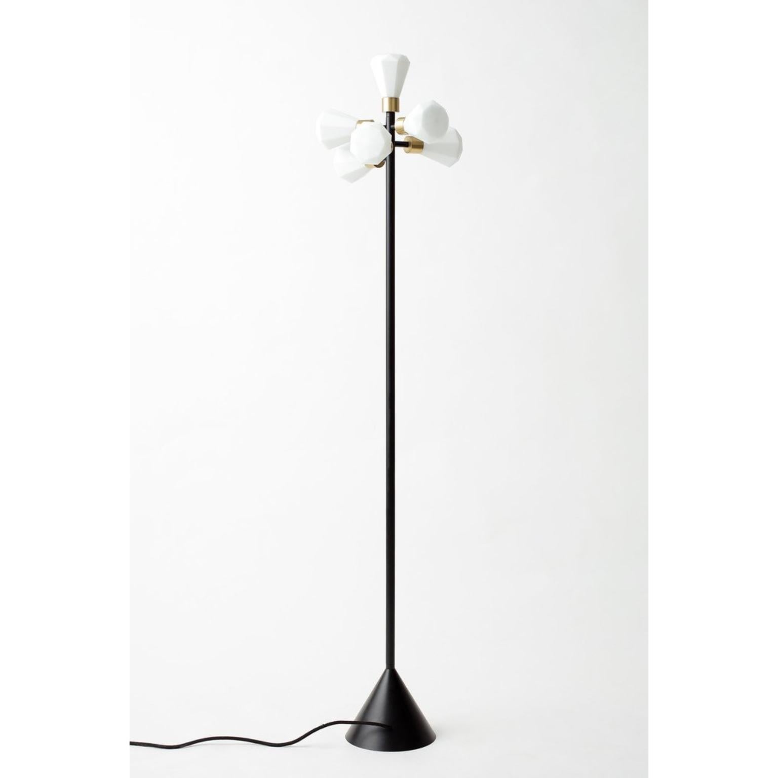 Unique cluster floor lamp by Hatsu
Dimensions: W 30 x H 148 cm 
Materials: Opal glass with powdercoated aluminium, brass details

Hatsu is a design studio based in Mumbai that creates modern lighting that are unique and immediately recognisable.