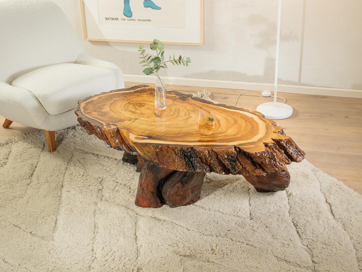 
Article Details
Unique coffee table from the 1970s. Solid acacia wood panel on three tree stumps with epoxy resin coating.
Quality Features:

    very good workmanship
    high quality materials
    Made in Germany

Good condition with slight signs