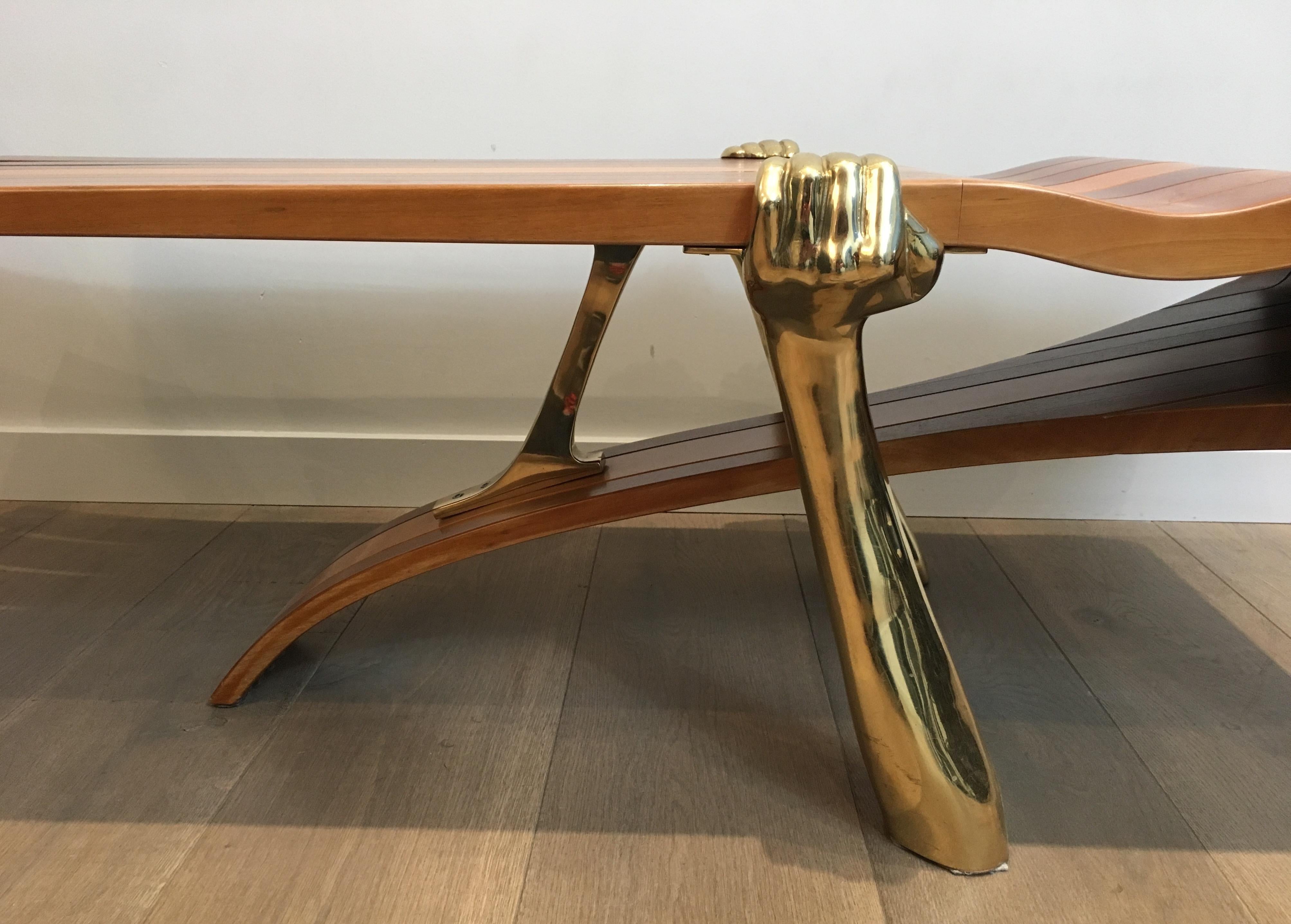 Unique Coffee Table Made of a Thick Freeform Wood Top Supported by Brass Arms For Sale 3