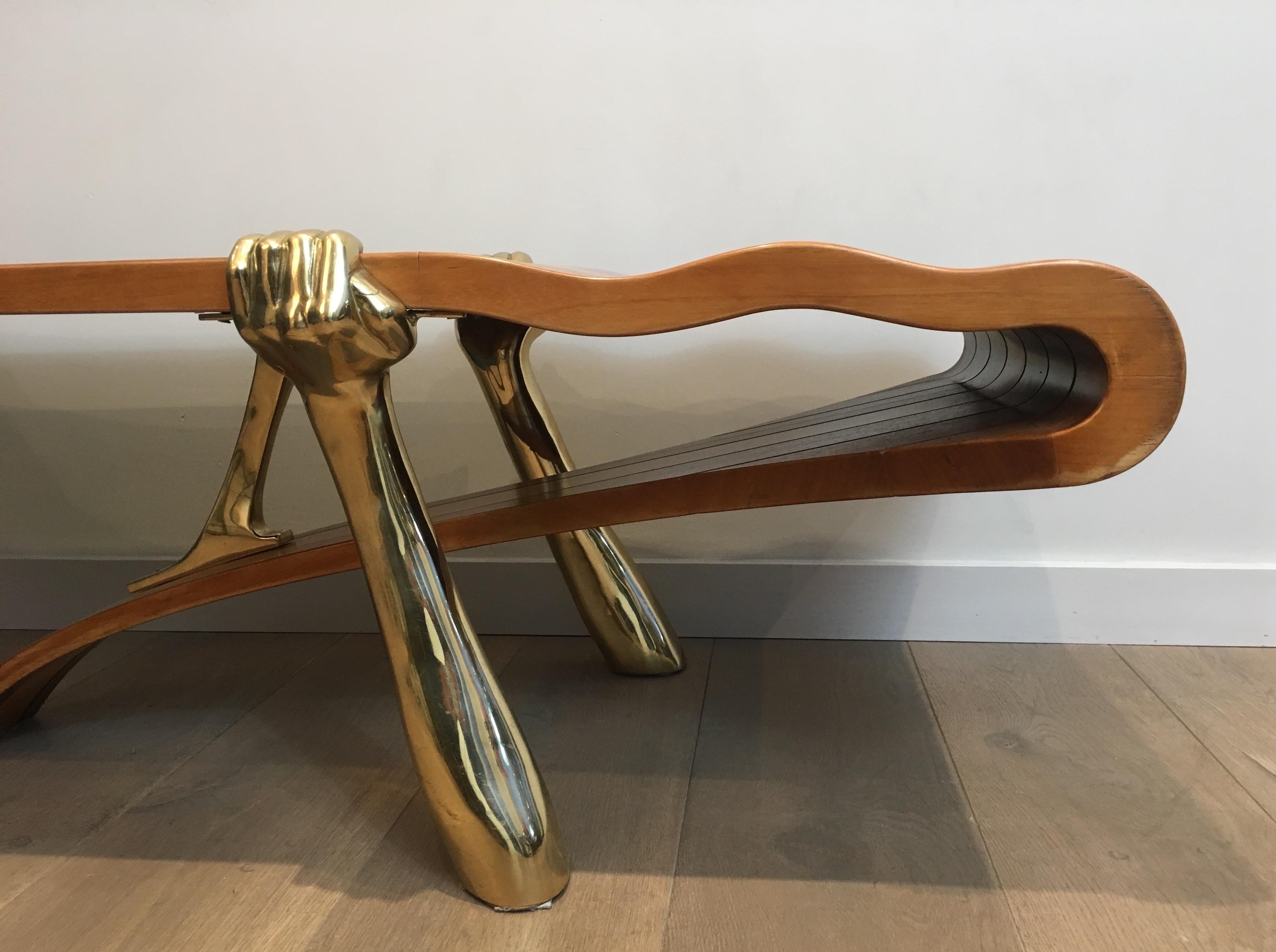 Unique Coffee Table Made of a Thick Freeform Wood Top Supported by Brass Arms For Sale 5