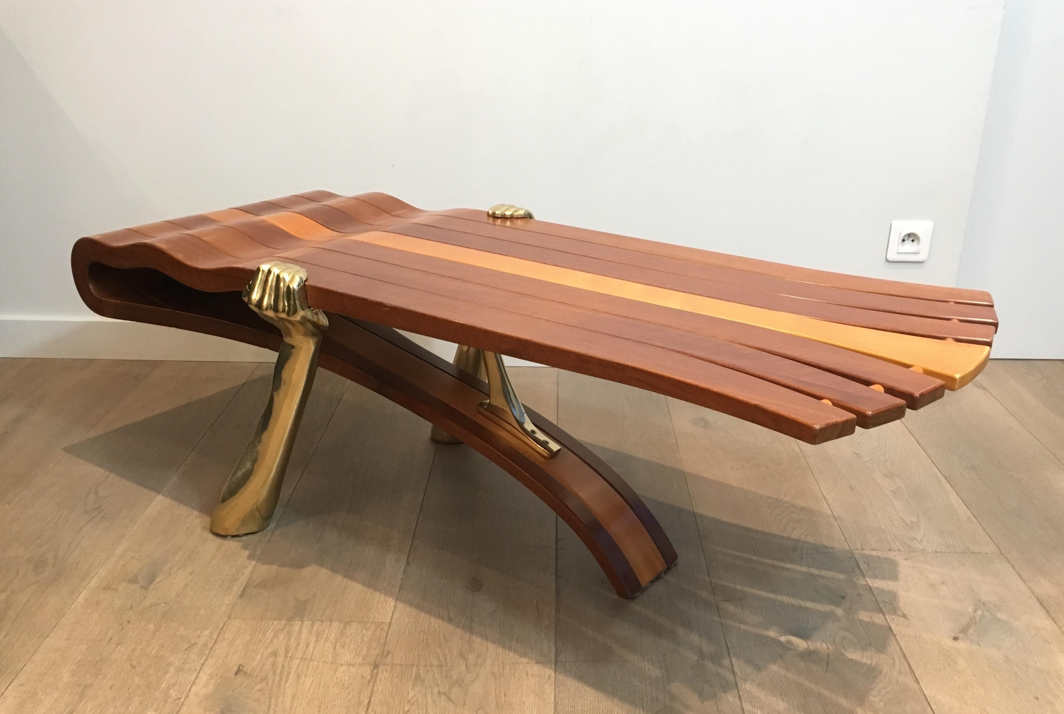Unique Coffee Table Made of a Thick Freeform Wood Top Supported by Brass Arms For Sale 12