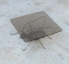 Unique Coffee Table with a Handcrafted Metal Cricket Sculpture Base