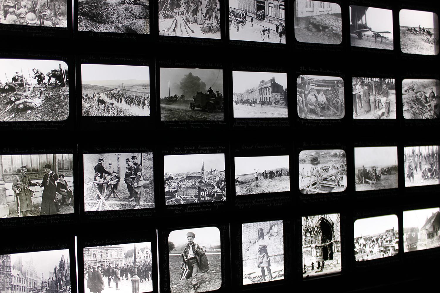 The group of forty-nine rare early 20th century hand-tinted glass magic lantern slides of WWI interest, showing related depictions of ‘The Great European War’ to include soldiers, trenches, aircraft and other related views, with each slide hand