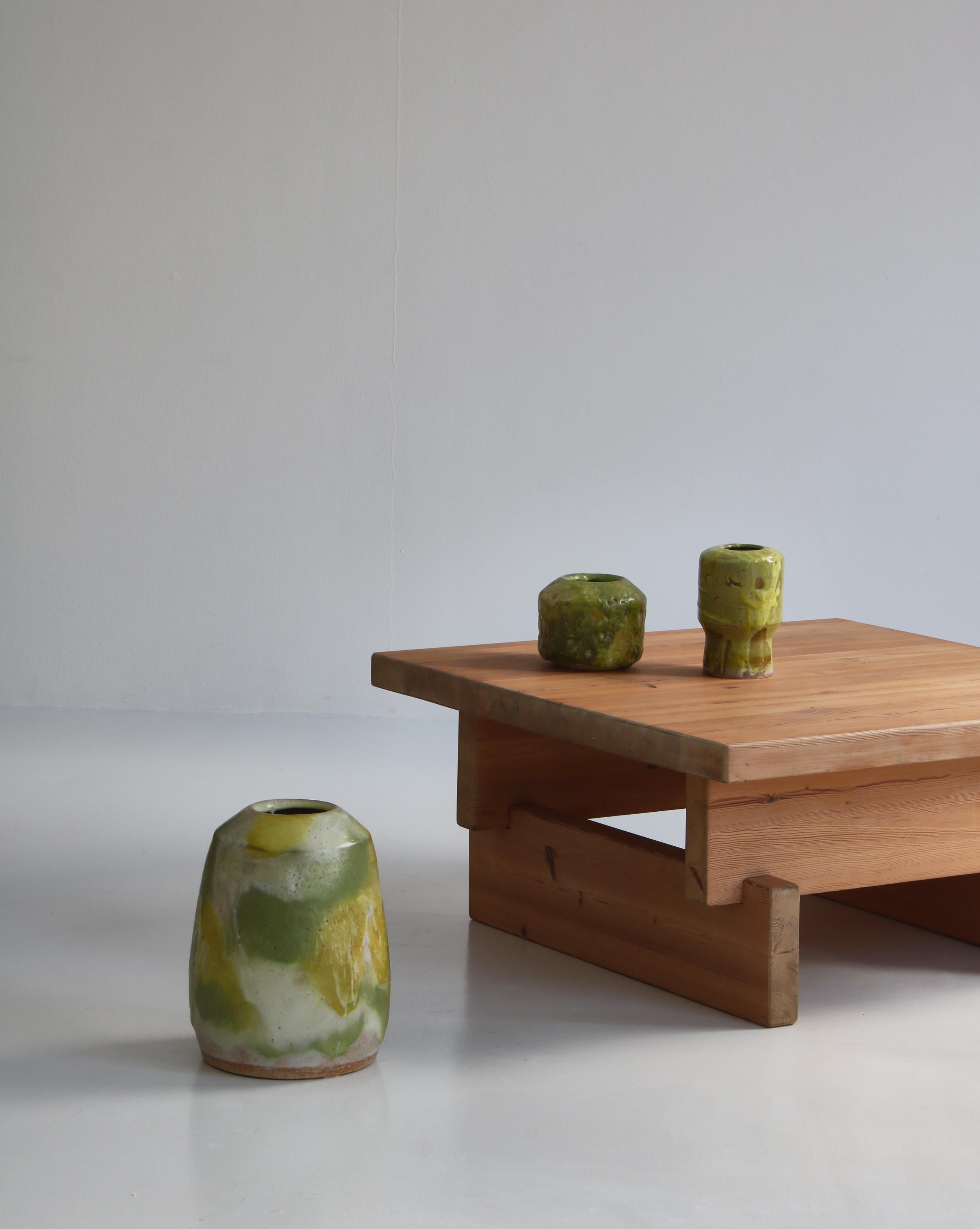 3 Stunning handmade stoneware vases by Danish artist Ole Bjørn Krüger (1922-2007) in his own workshop in the 1960s. Beautiful organic shape and thick green glazing. Krüger was known for his raw and brutalistic style often using thick glazings in