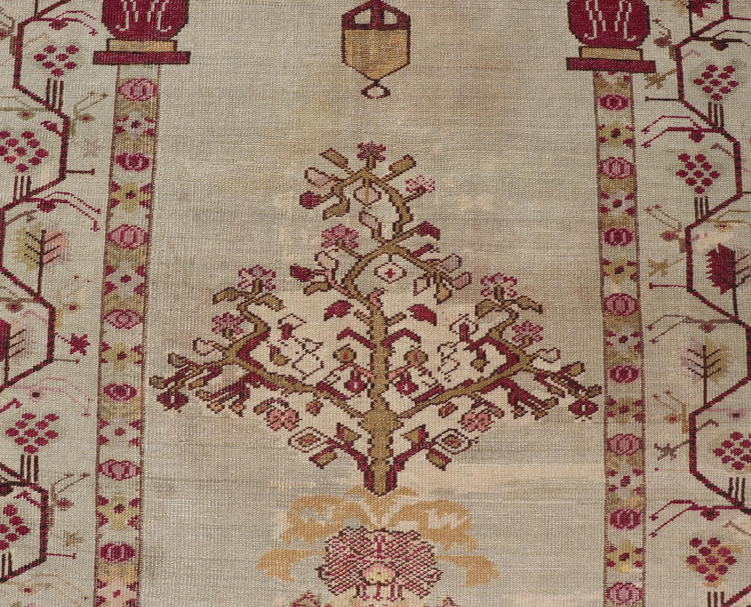 Antique Turkish Oushak prayer design rug in ivory background and various tones in unique Color combination with Columns, Chandelier & Vase design
Keivan Woven Arts/ Rug / V21-0808, 

Measures: 4'0 x 6'10.