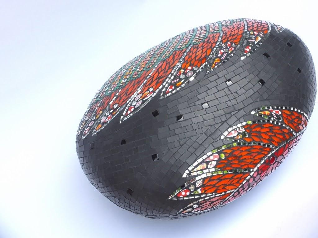 One of a kind mosaic ottoman pouf sculpture created using an original vintage small customized covered in fragments of ceramic, porcelain dishes, mirrors, glass, etc. All these different materials are gather together and handcut one by one. Then the