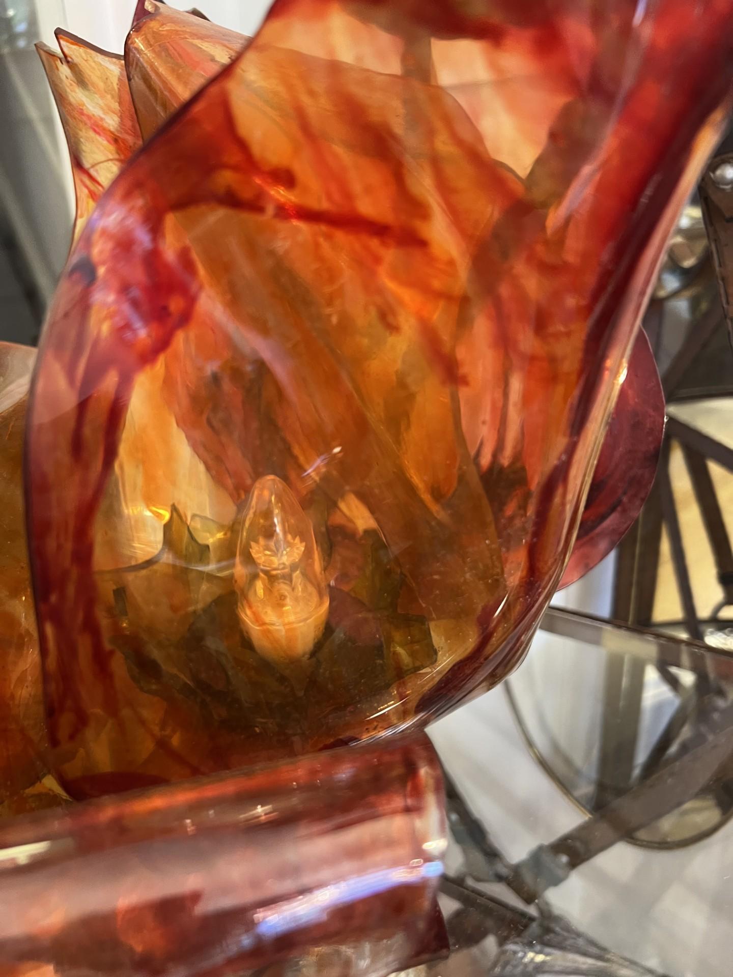 This unique sculptured table lamp made of coloured lucite on the travertine base Italian c. 90's. Wired for UK standards, consuming 40W bulbs, perfect and decorative piece in your house. Attributed to Gaetano Pesce