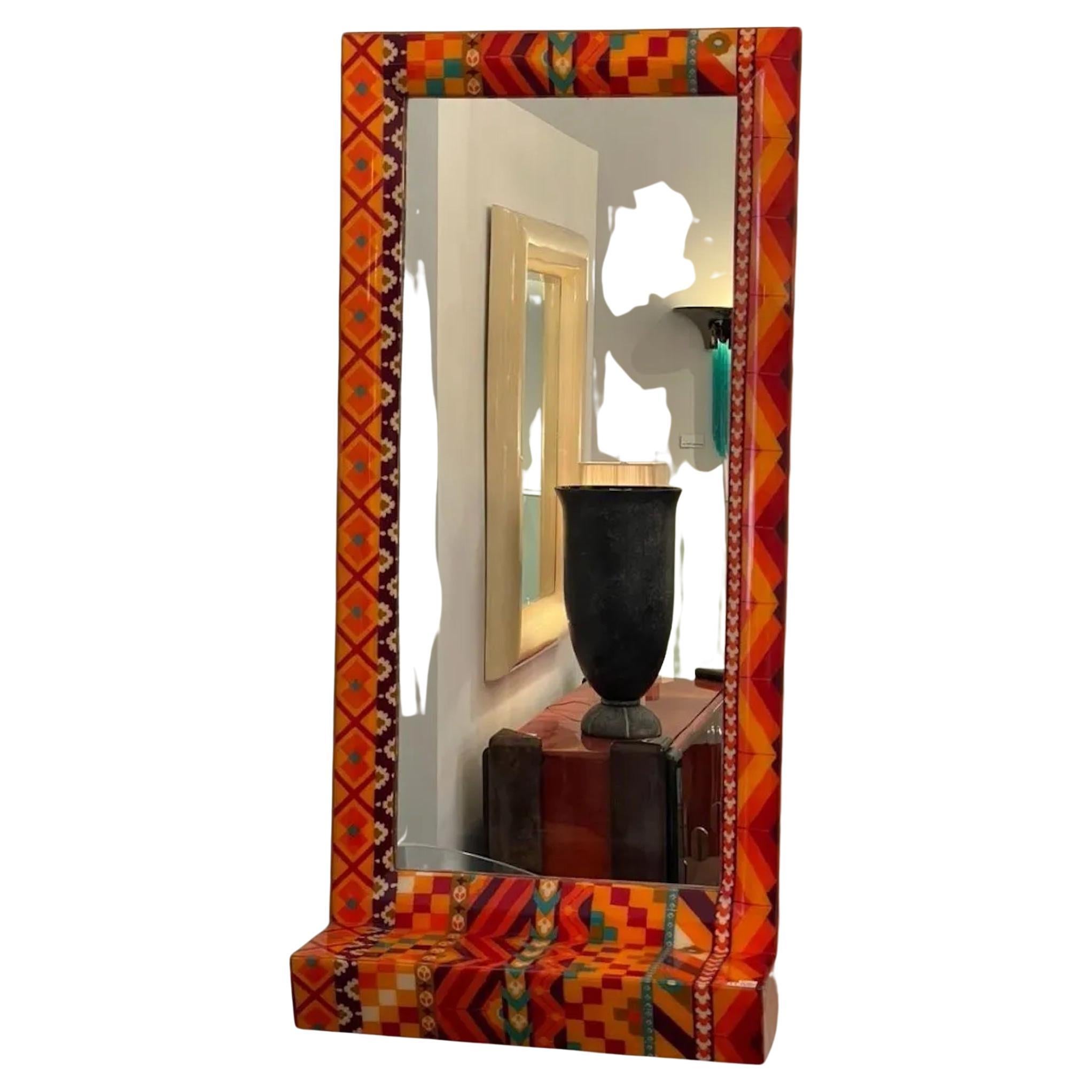 Unique colourful  lacquered fabric mirror by Karl Springer
Provenance: Property from the personal collection of Jeff Schuerholz of Fat Chance, the iconic Los Angeles store for the Hollywood elite.
USA: circa 1970