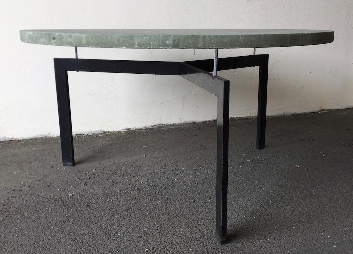 Made to order concrete table from an architects home in Germany. Used in and outdoors. Very heavy.