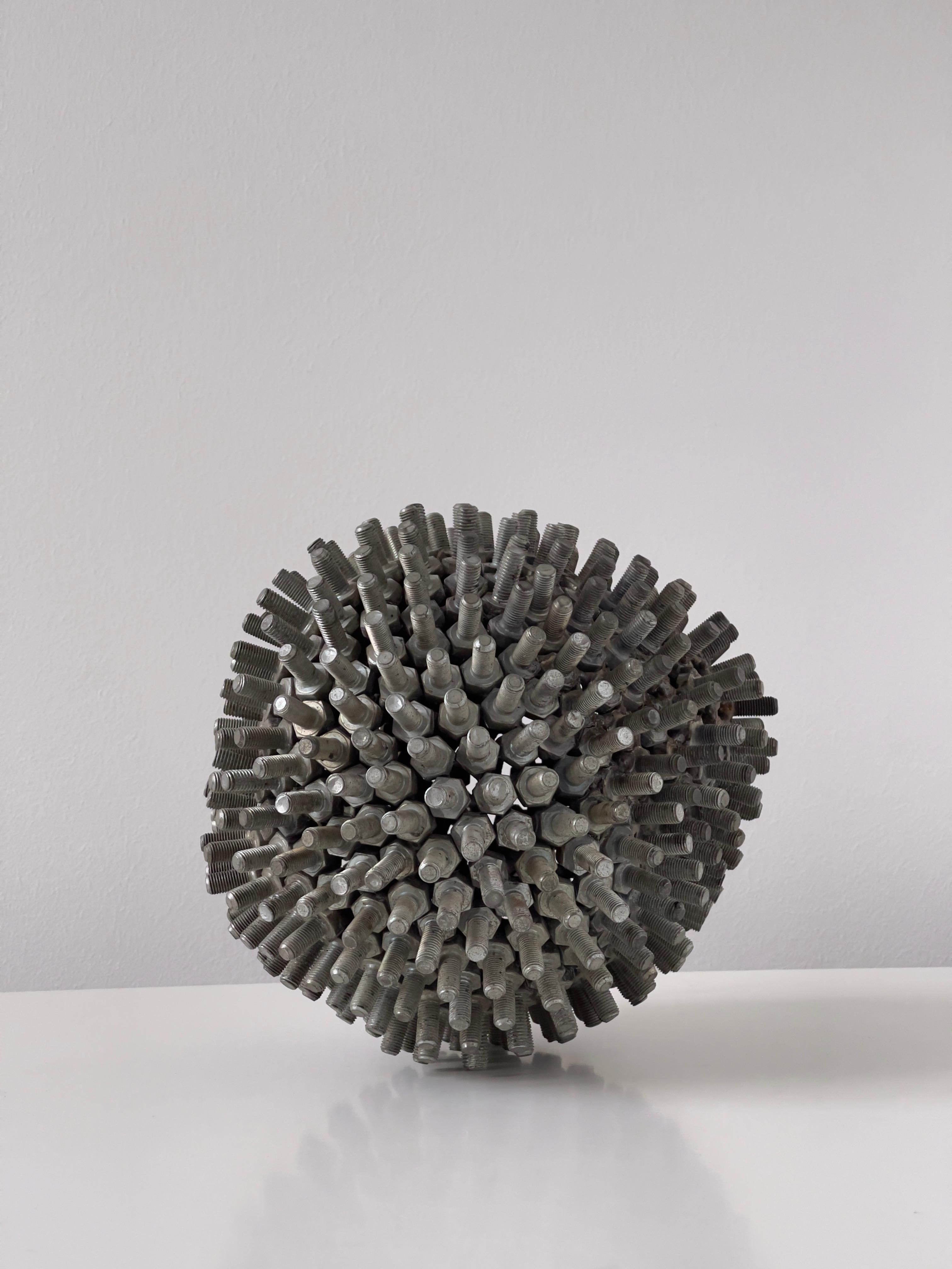 Anonymous late 20th Century European modern sculpture. Sphere of metal bolts. In Good Condition For Sale In København K, 84