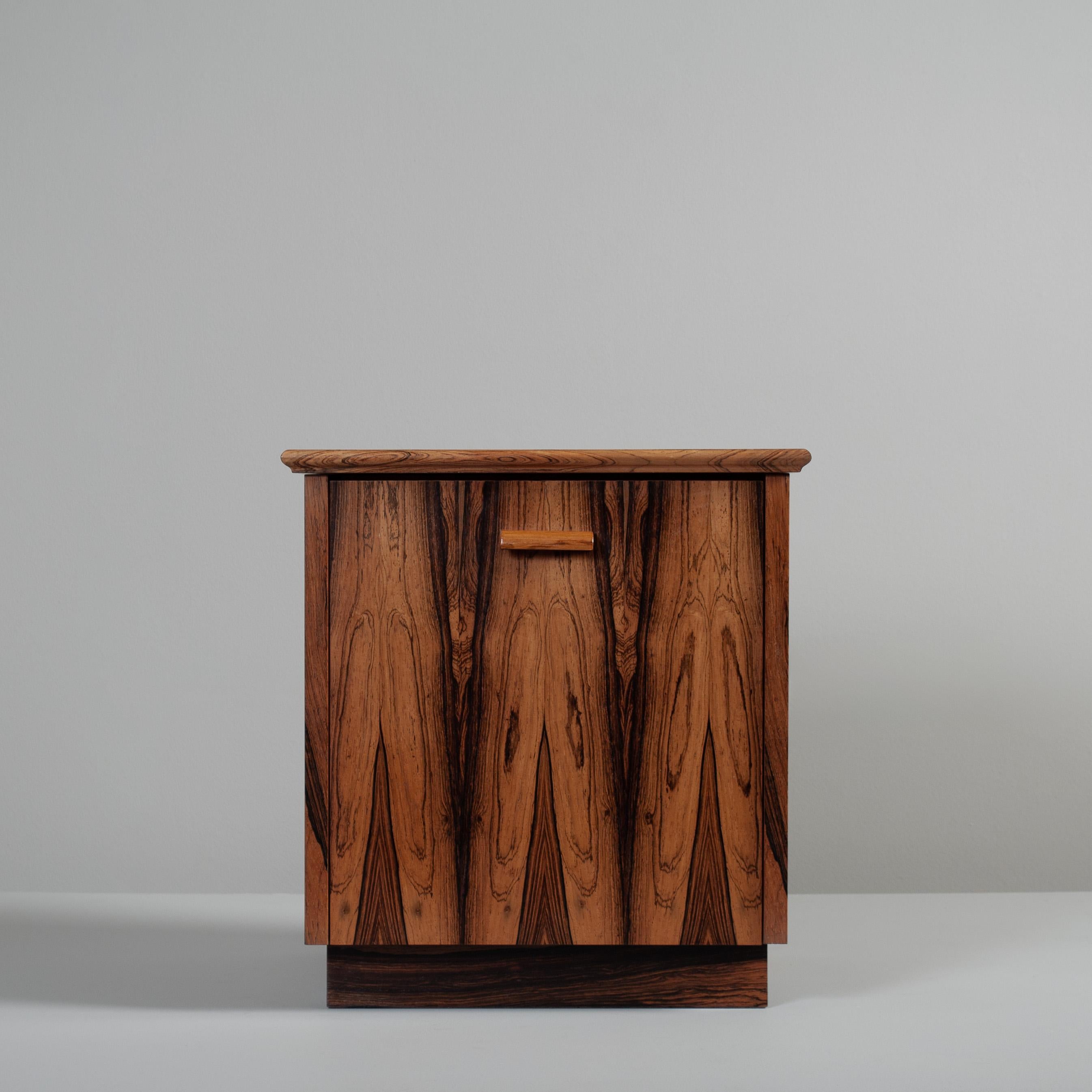 A spectacular Danish cube nightstand - end table, circa 1950/60. One door to the front with curved sculpted handle. Ample storage. A very appealing cube design with magnificent grain and figuring.
Great condition. 
Cleaned/polished.
