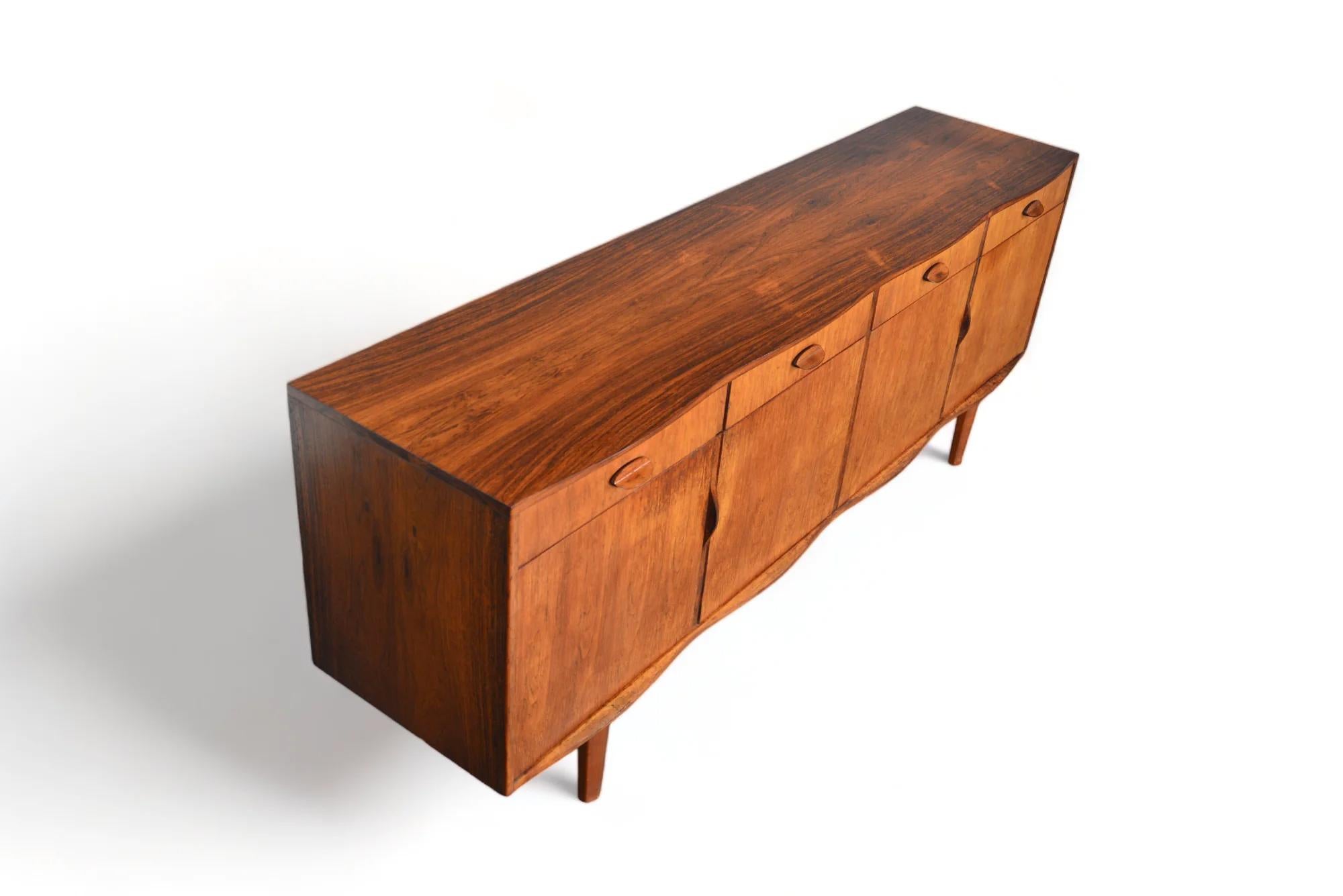 Unique Curved Edge Mid Century Credenza In Rosewood For Sale 1