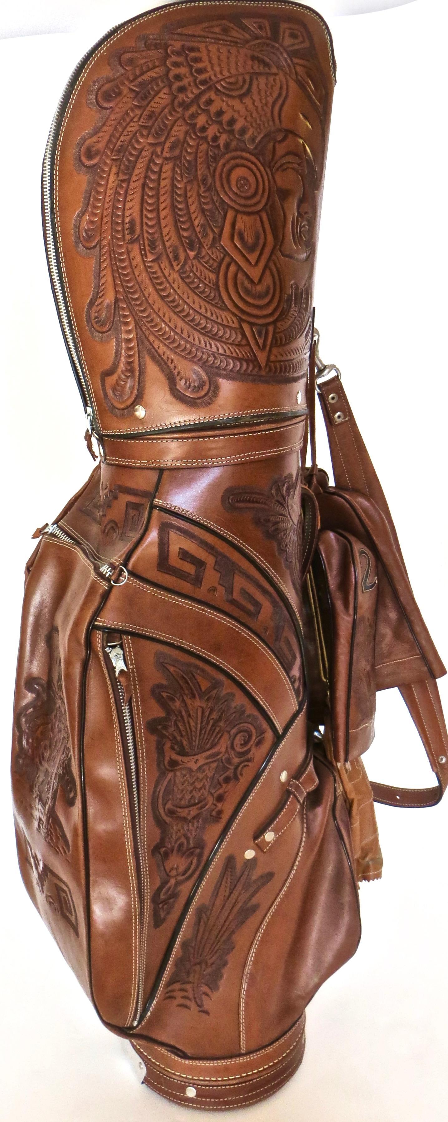 This is a very unique and one of a kind item; consisting of a Custom Made Hand Crafted Leather Designer Golf Bag, in Western Motif; all hand tool and dyed. Images consisting of Native American Indians; Cactus, and a mythological winged subject on