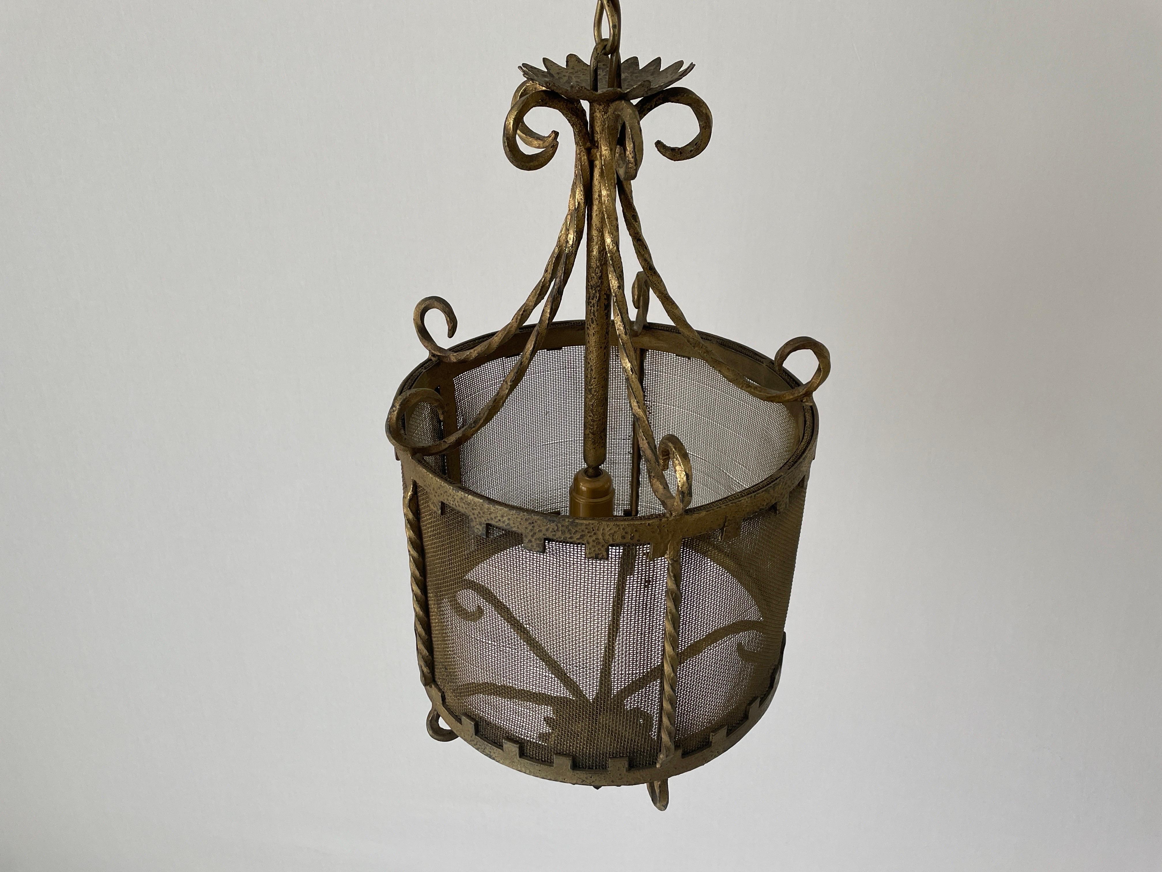 Unique Cylindrical Wrought Iron Hall Ceiling Lamp, 1940s, Germany

Lampshade is in very good vintage condition.
No crack, no missed piece. Heavy product with floral ornates
Original canopy.

This lamp works with E27 light bulb. Max 100W
Wired and