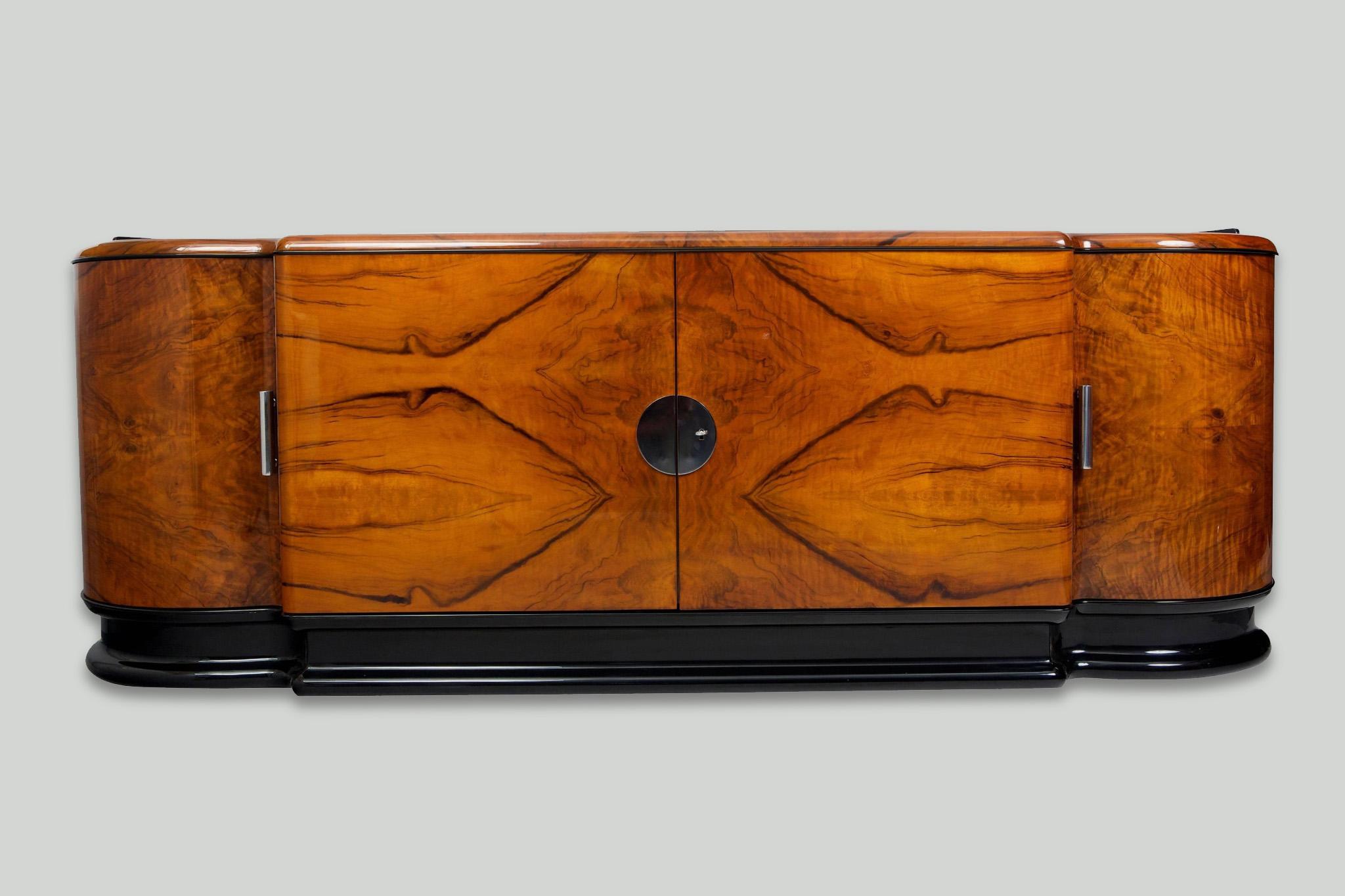 Completely restored unique Art Deco saloon sideboard.
Source: Czechia - Czechoslovakia (Bohemia)
Material: Walnut
Surface was made by piano lacquers to the high gloss.
Period: 1920-1929.





   