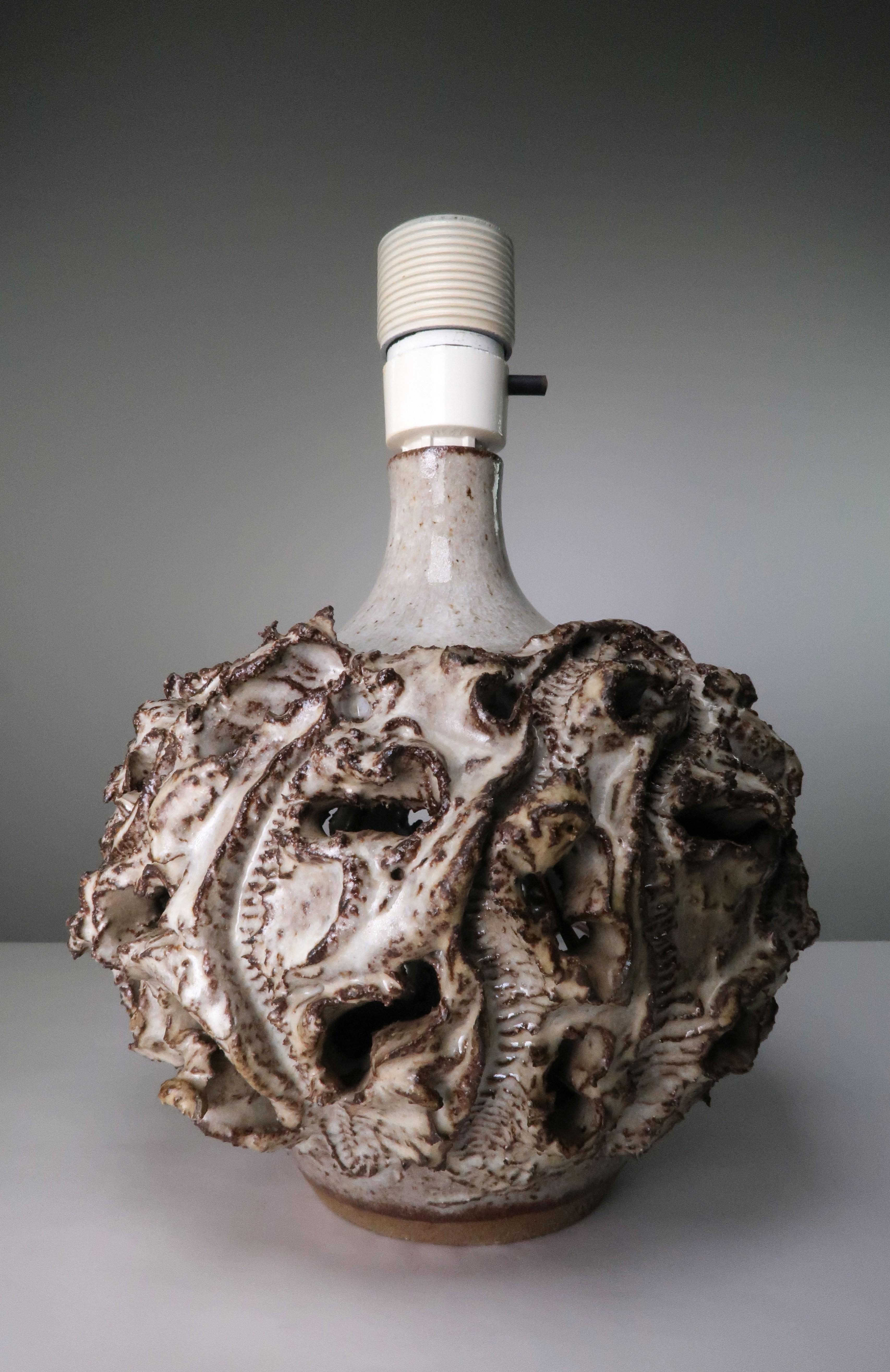 Spectacular, one-of-a-kind piece of ceramic art. Mid-Century Modern handmade sung glazed voluptuous ceramic art table lamp by Danish experimental artist Bodil Marie Nielsen. A beautiful example of Nielsen's characteristic process which included