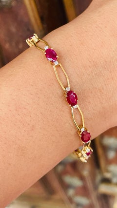 Bracelet tennis unique en or jaune massif 14 carats avec rubis rouge profond et diamants