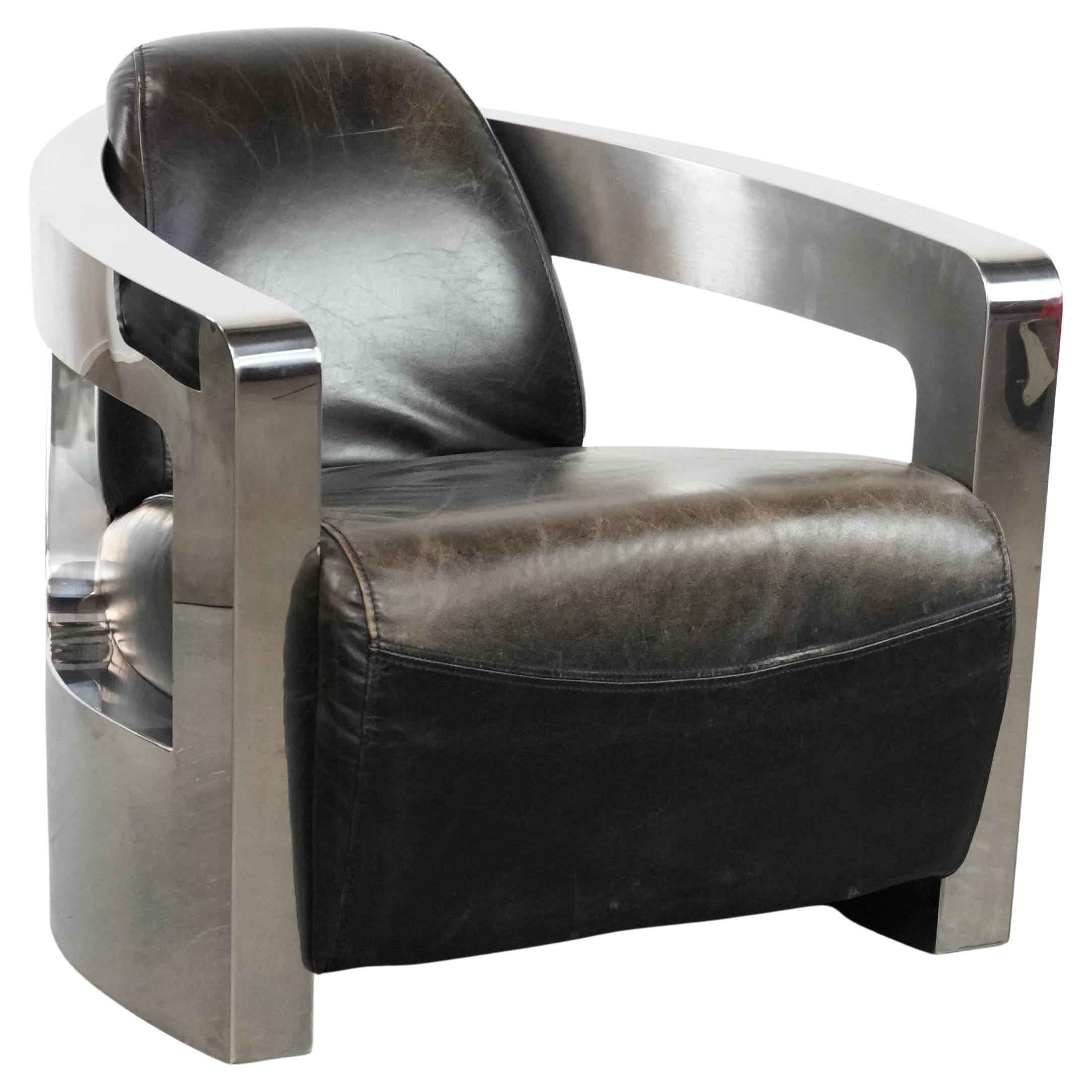 Unique design Aviator armchair with an aluminium frame For Sale